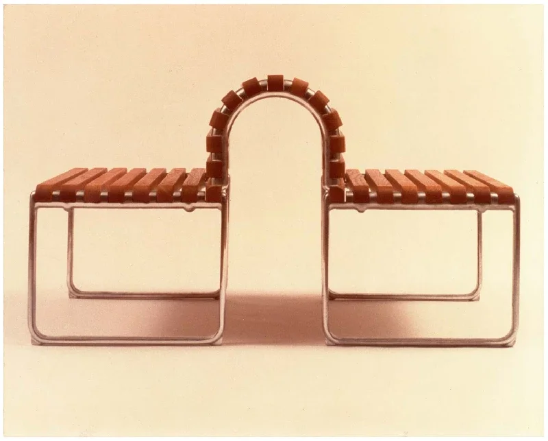 A metal and wooden bench by john caldwell