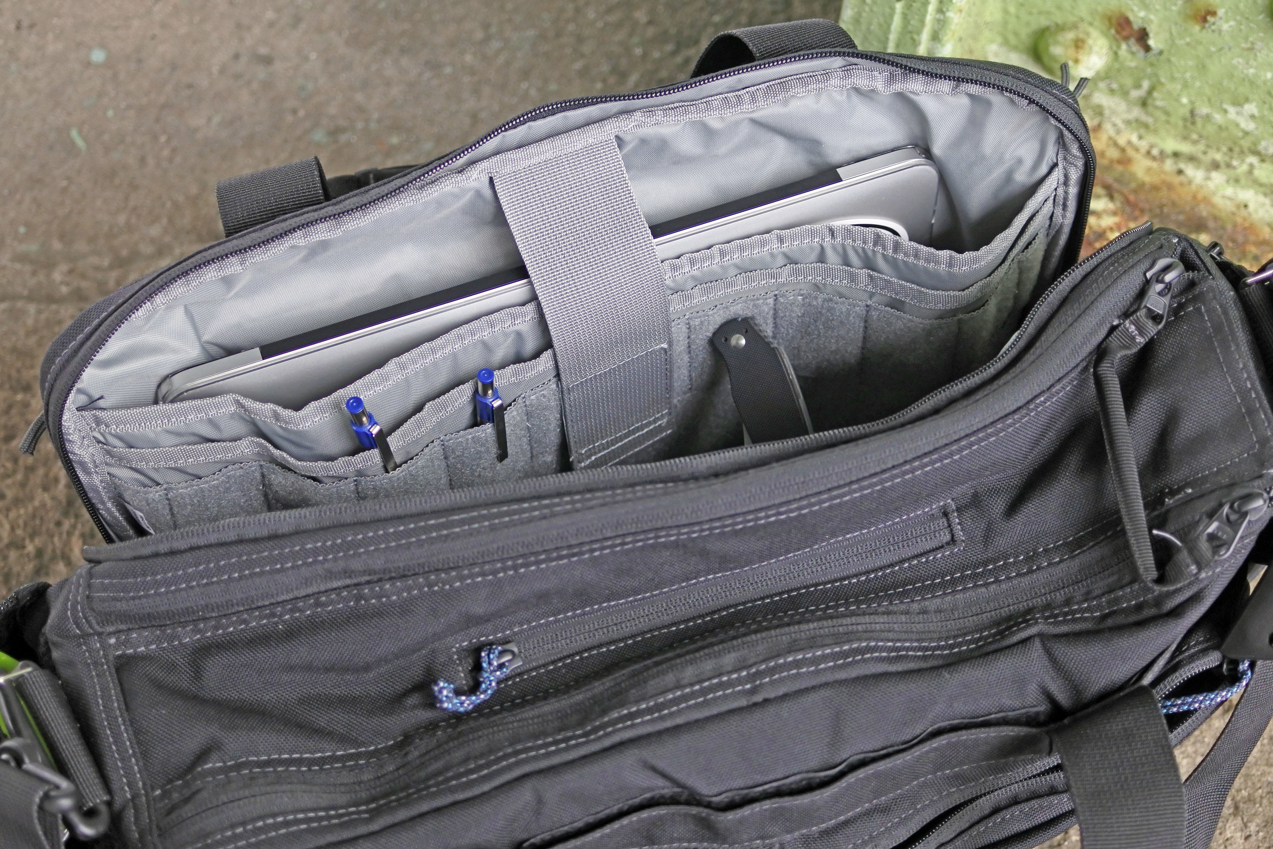 13" MBP is swimming in that huge laptop sleeve! There are also two narrower padded sleeves that fit my Kindle Touch well. 