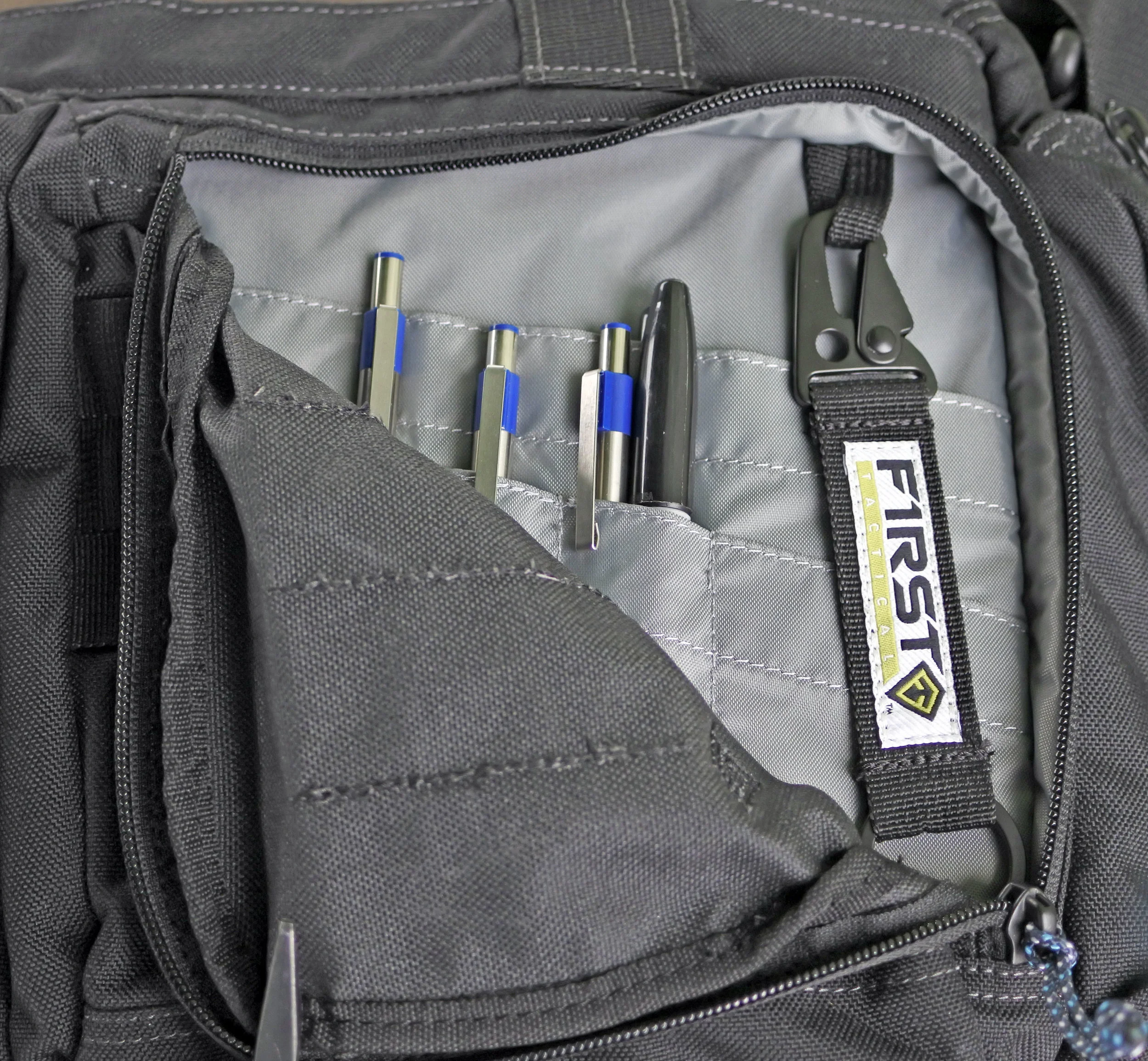 These admin pockets have some depth to them; you can stow a pocket organizer in there or a small book!