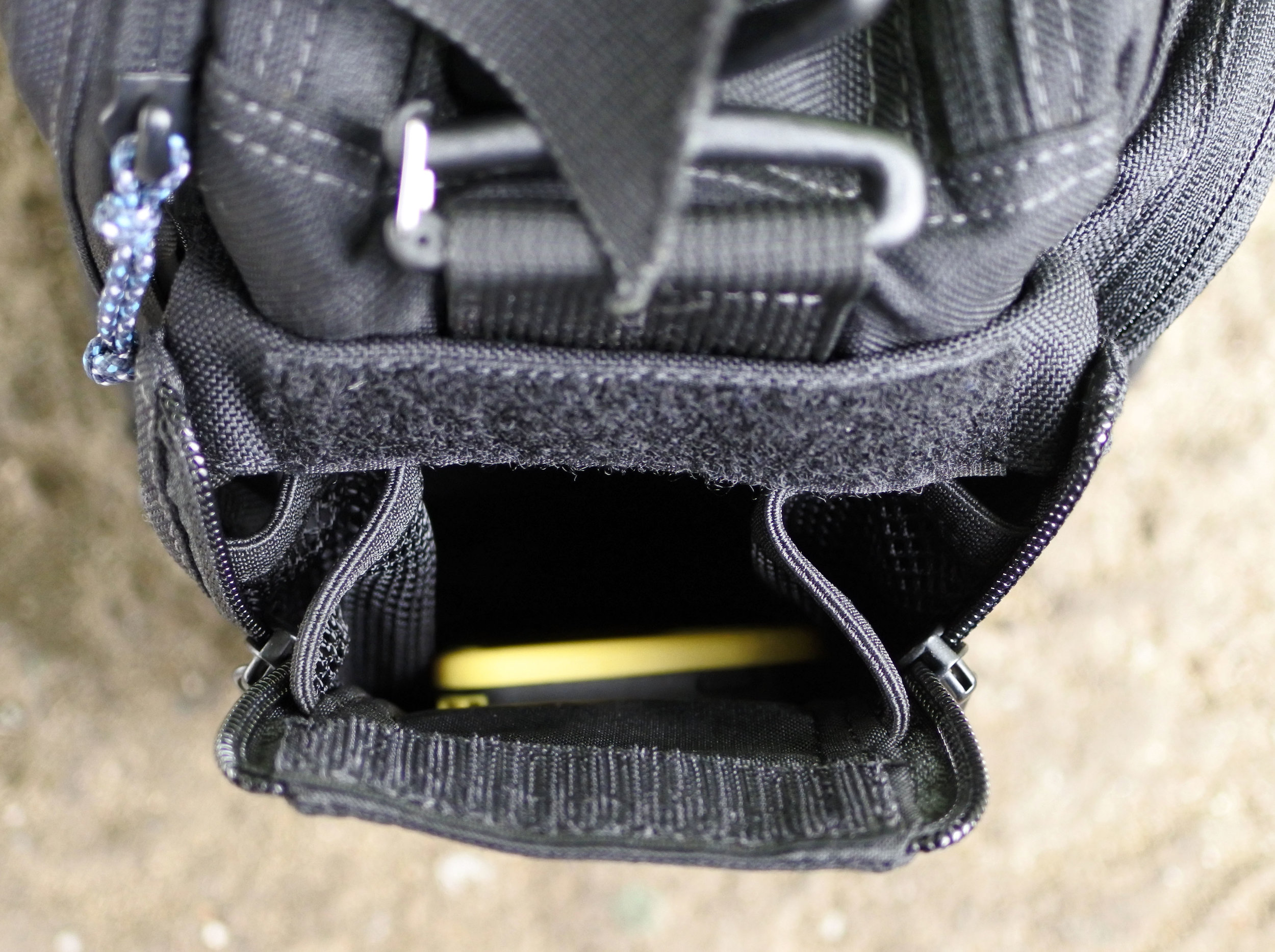 Bottle pocket fully collasped still makes a useful little slip pocket. 