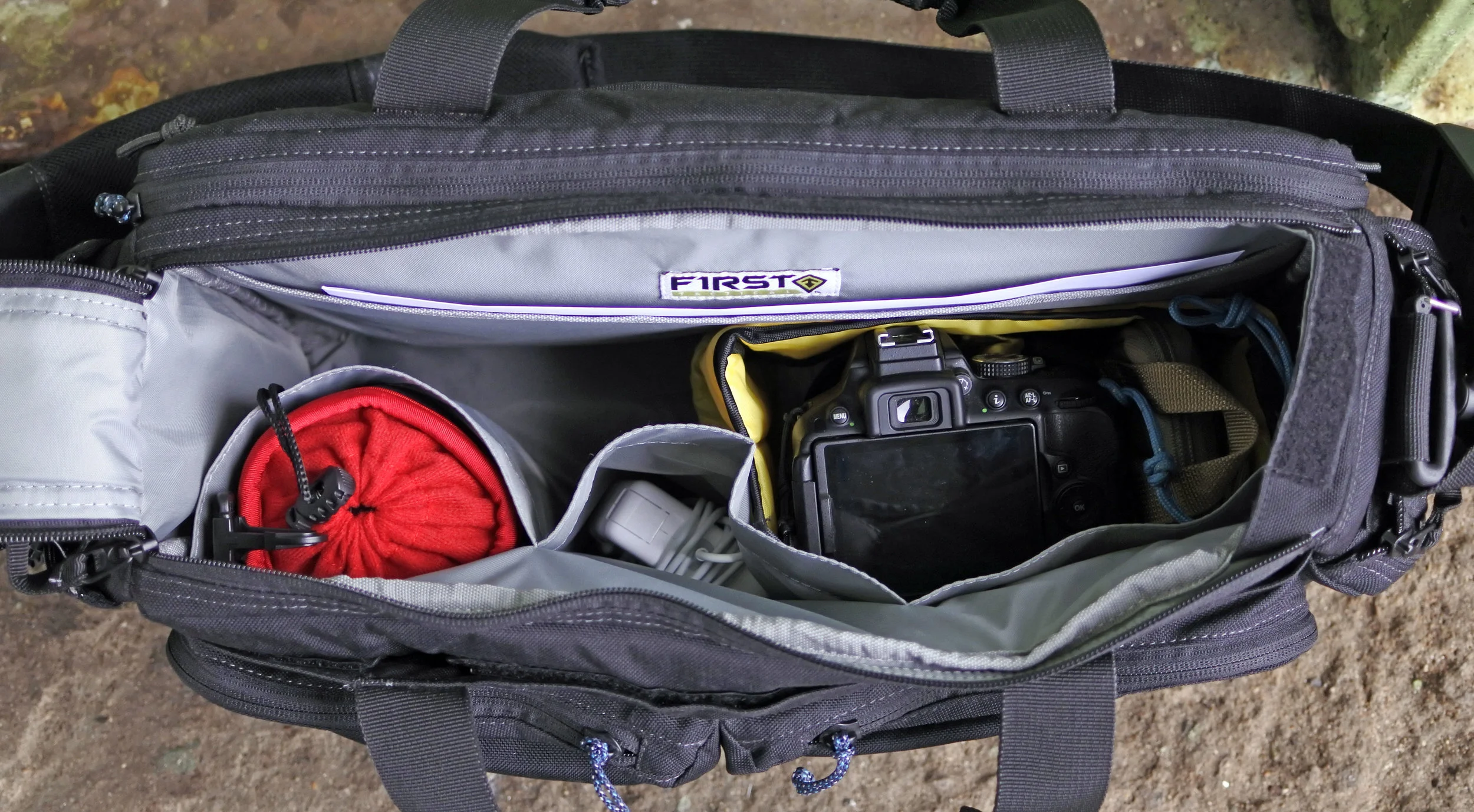 Looking into the bag from above. There are 3 open top pockets on the front wall and a document sized sleeve on the rear. 