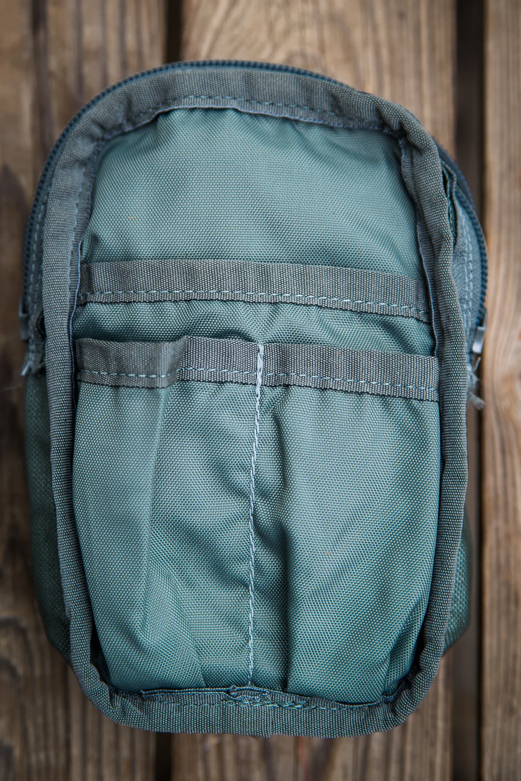 The rear side of the main compartment, turned inside out. 
