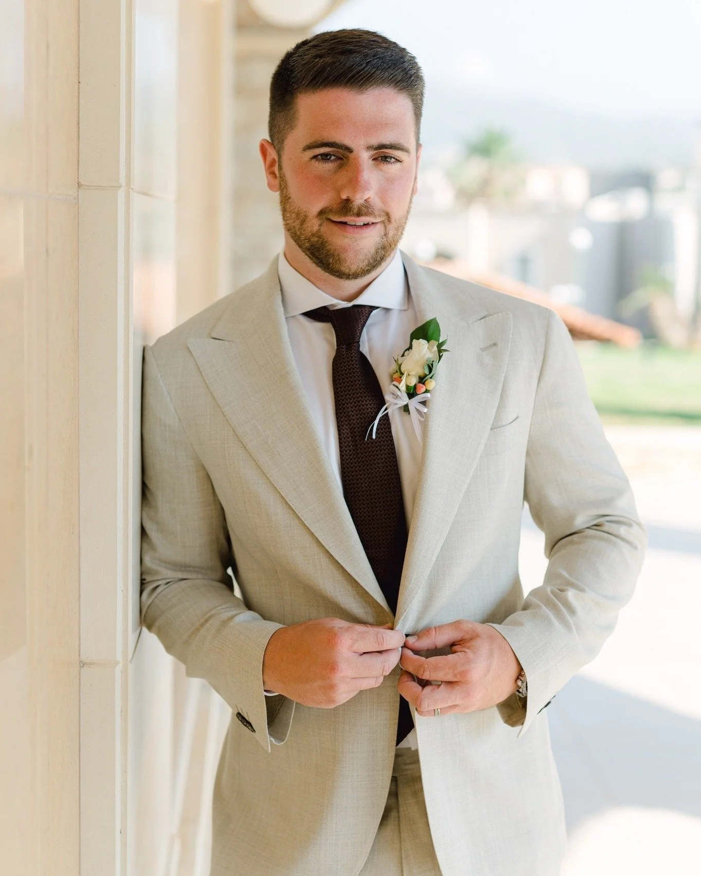 George perfectly shows how a carefully composed outfit completes a look,
The brown tie anchors his rich dark hair and draws the eye inward
Focus on the small details and the outfit comes together beautifully 
Cloth by @loropiana