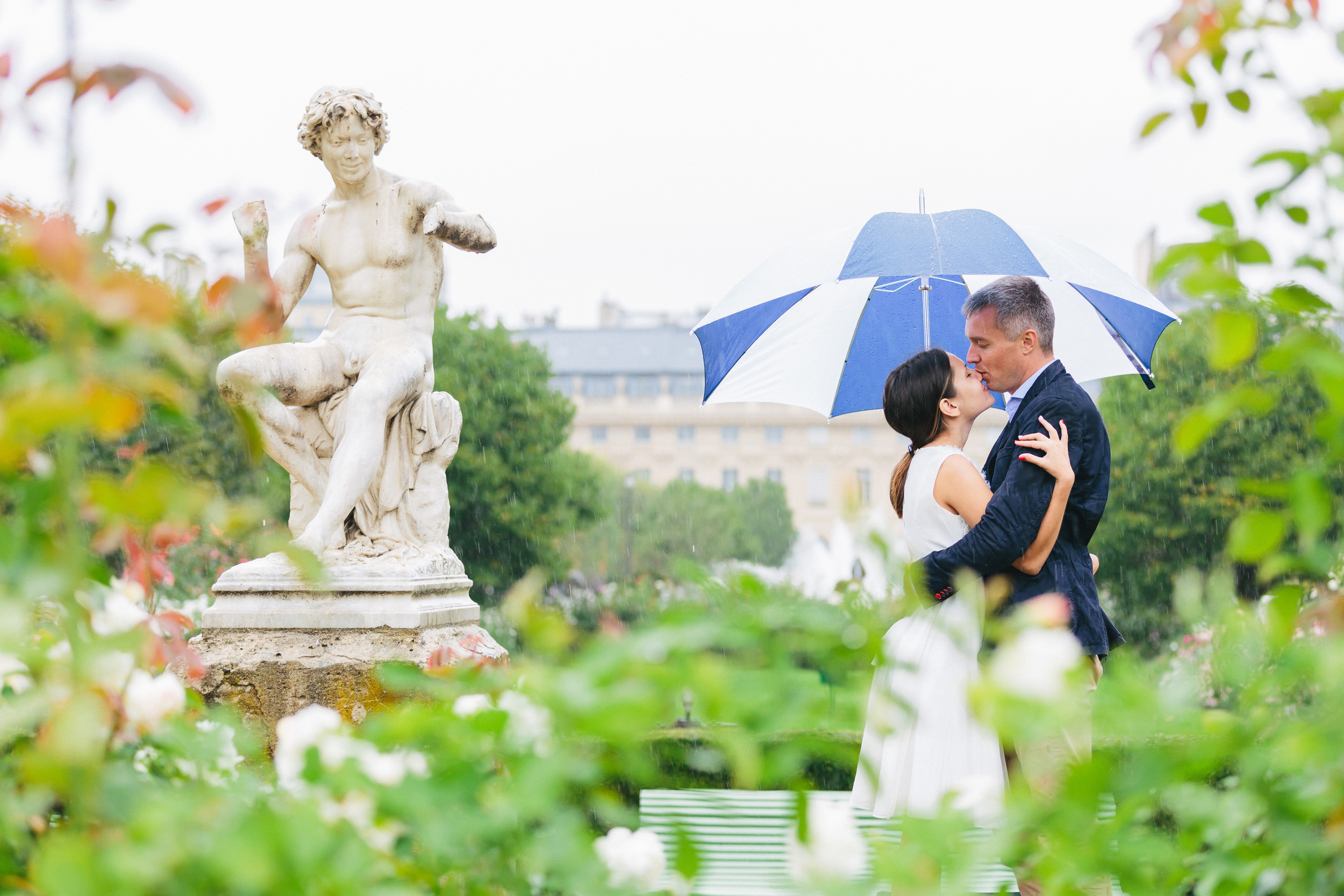 Paris Photographer Couple Session Palais Royal Rain Umbrella IheartParisfr