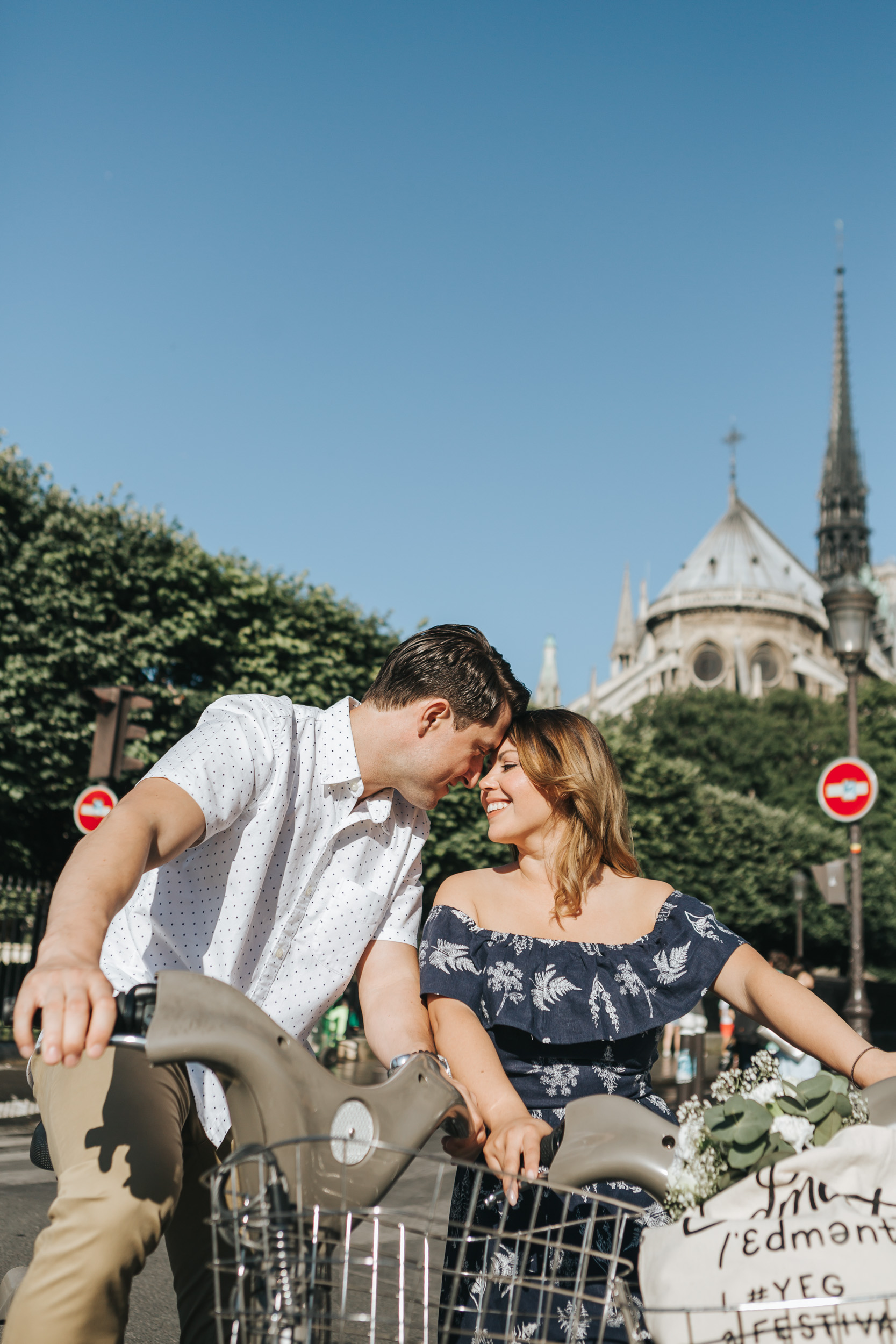 Paris Photographer Couple Session Love Story Notre Dame Flowers Anniversary Velib bicycle
