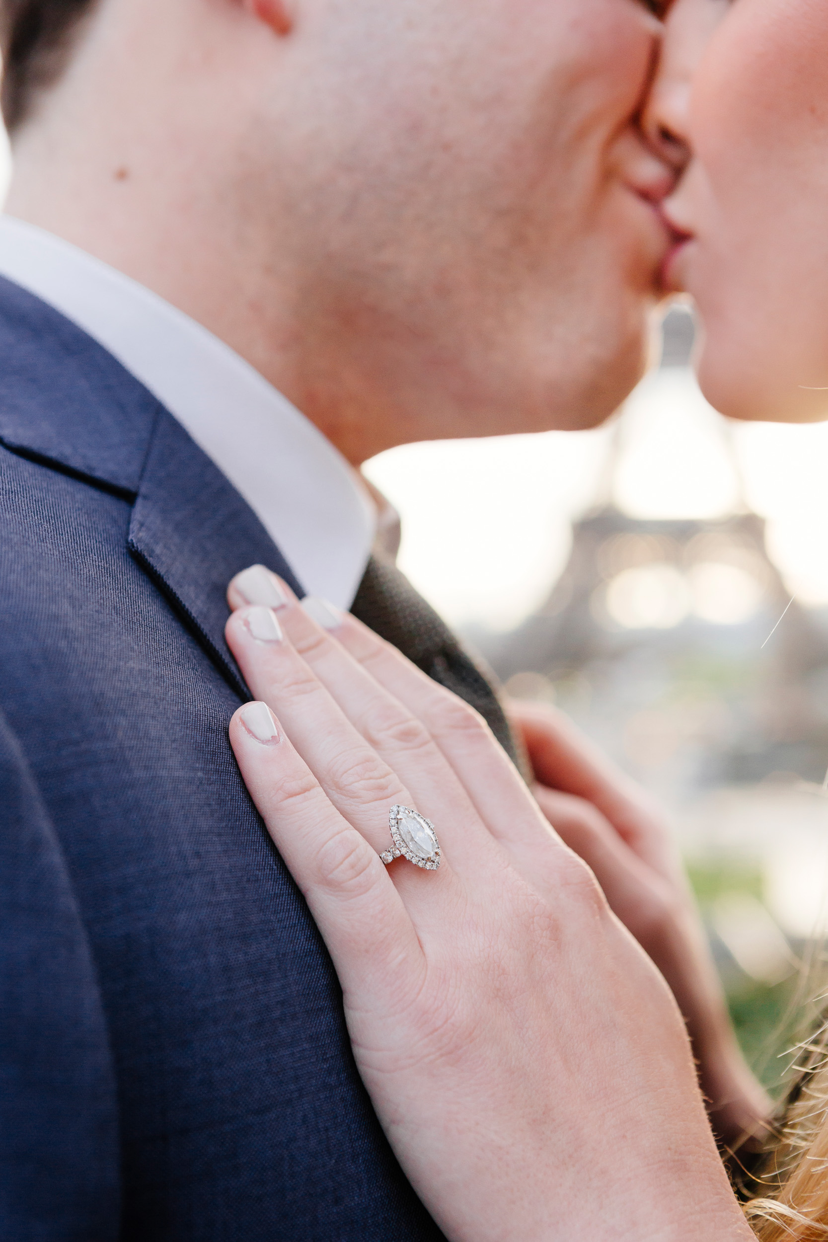 Close up of diamond engagement ring detail with the view of Eiffel Tower captured by Paris Photographer Federico Guendel www.iheartparis.fr
