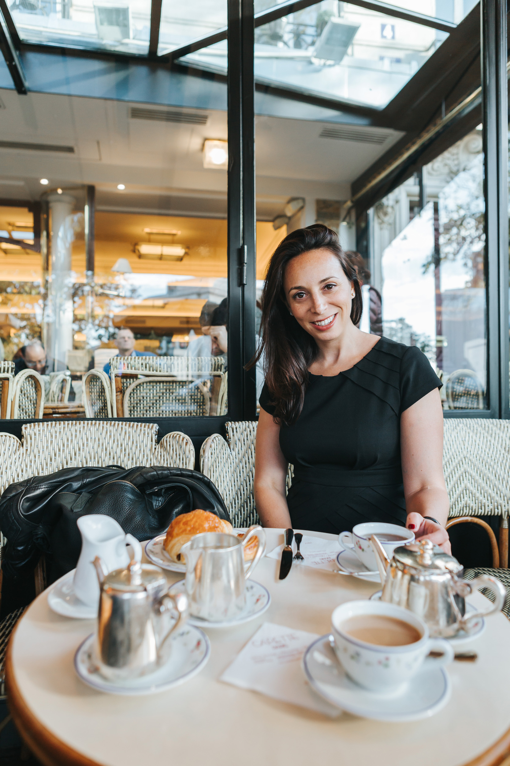 Portrait of Rebecca Plotnick founder of Every Day Parisian blog at cafe Carette captured by Paris Photographer Federico and Anastasia Guendel IheartParisFr TheFlyingPoodle