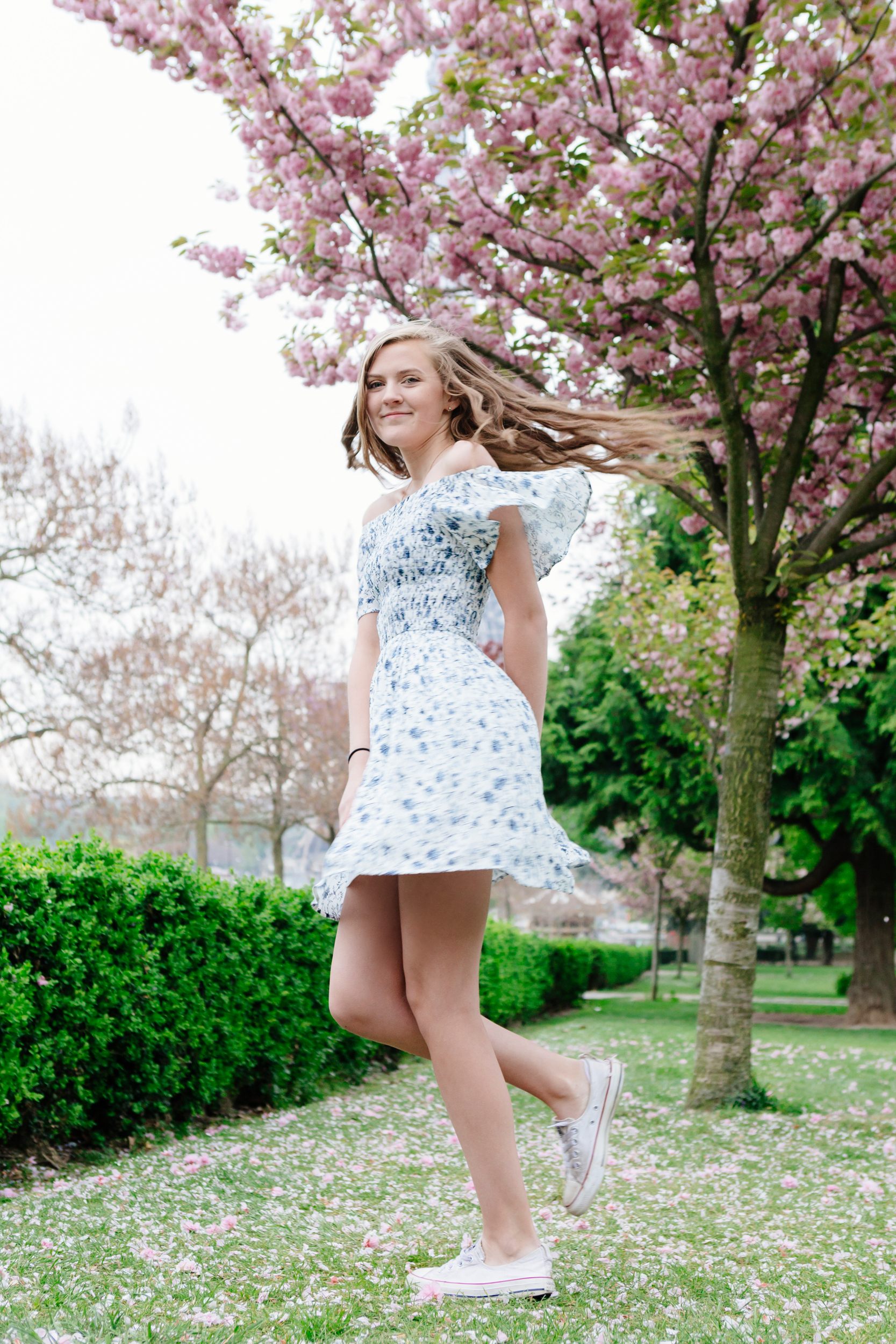 Sweet sixteen in cherry blossoms girl portrait at Trocadero and the Eiffel Tower by Paris Photographer Federico Guendel IheartParisfr