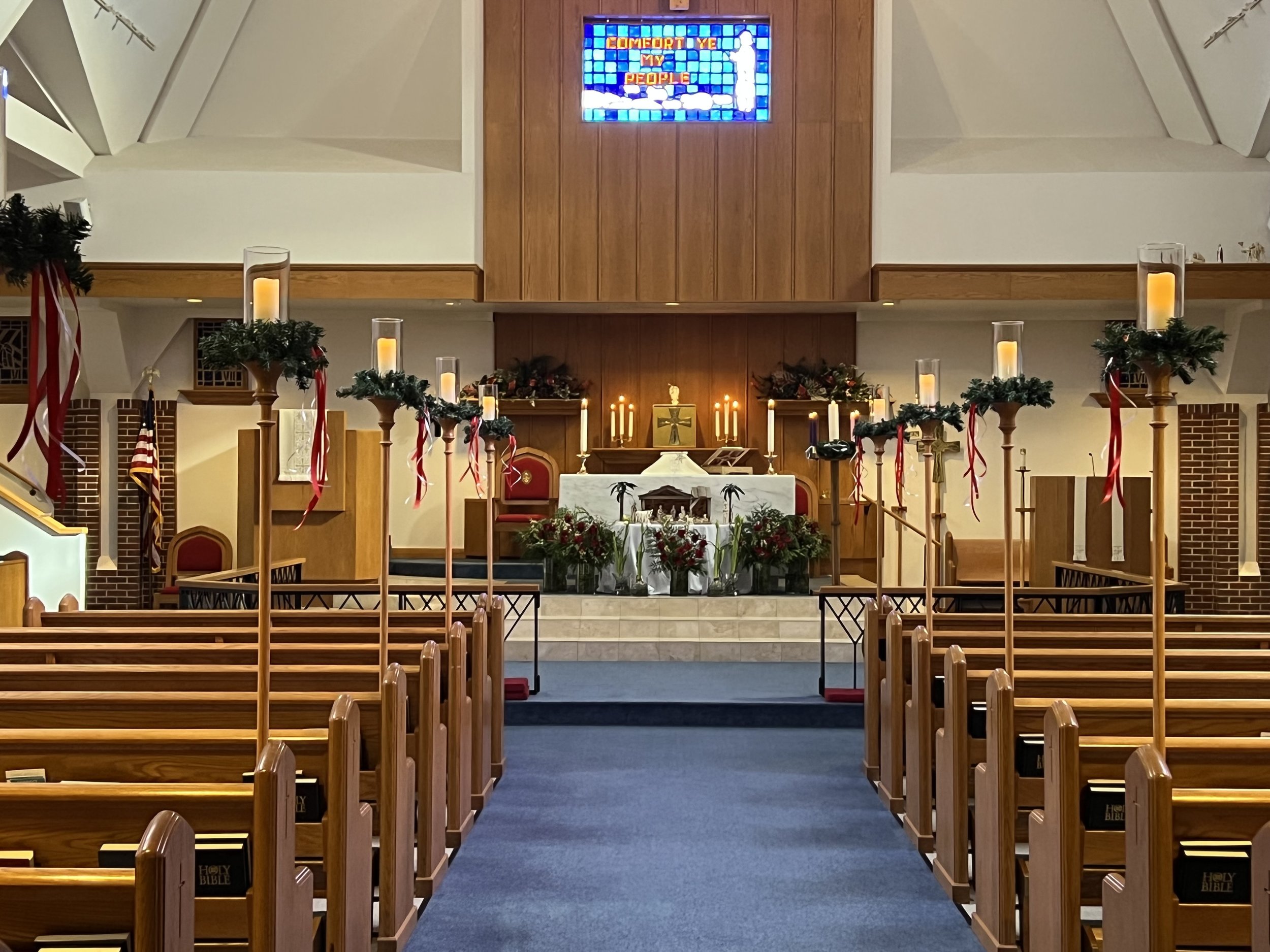 Aisle View of Christmas Altar and Flowers.jpg