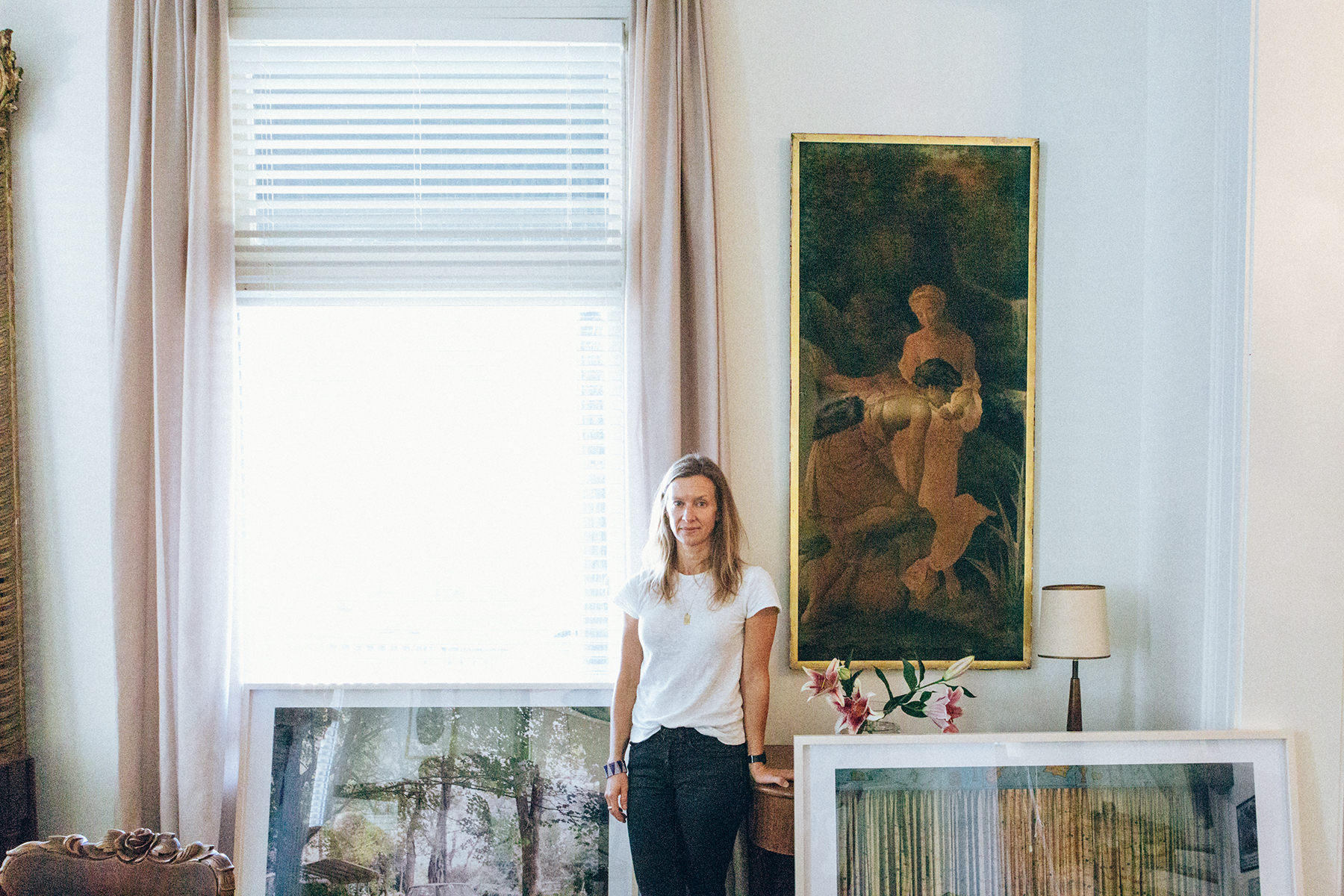 Photographer Caroline Allison at home in west Nashville, surrounded by work from Underground Again , her new show at Nashville's Zeitgeist gallery. All photos by Heidi Ross