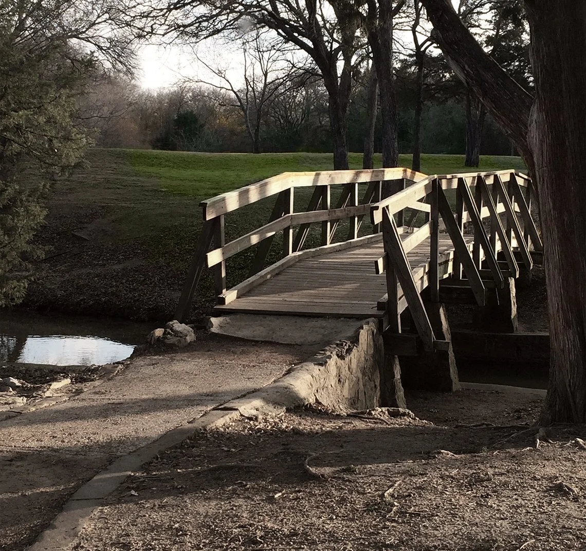 A bridge overlooking water symbolizes starting the journey towards brainspotting near me.