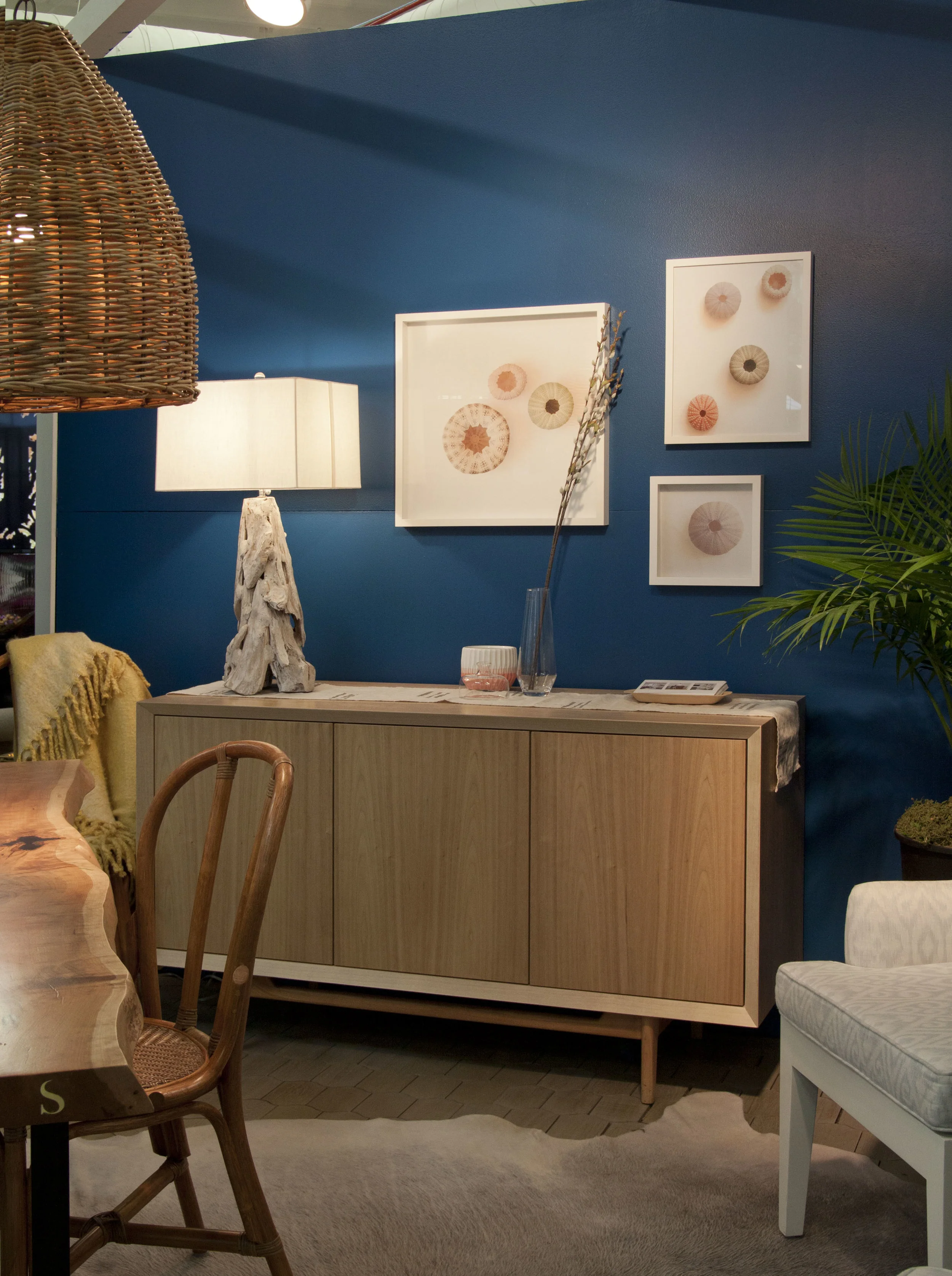 I designed the bleached walnut console, and also contributed the sea urchin photos. The fantastic lamp is from Arteriors.