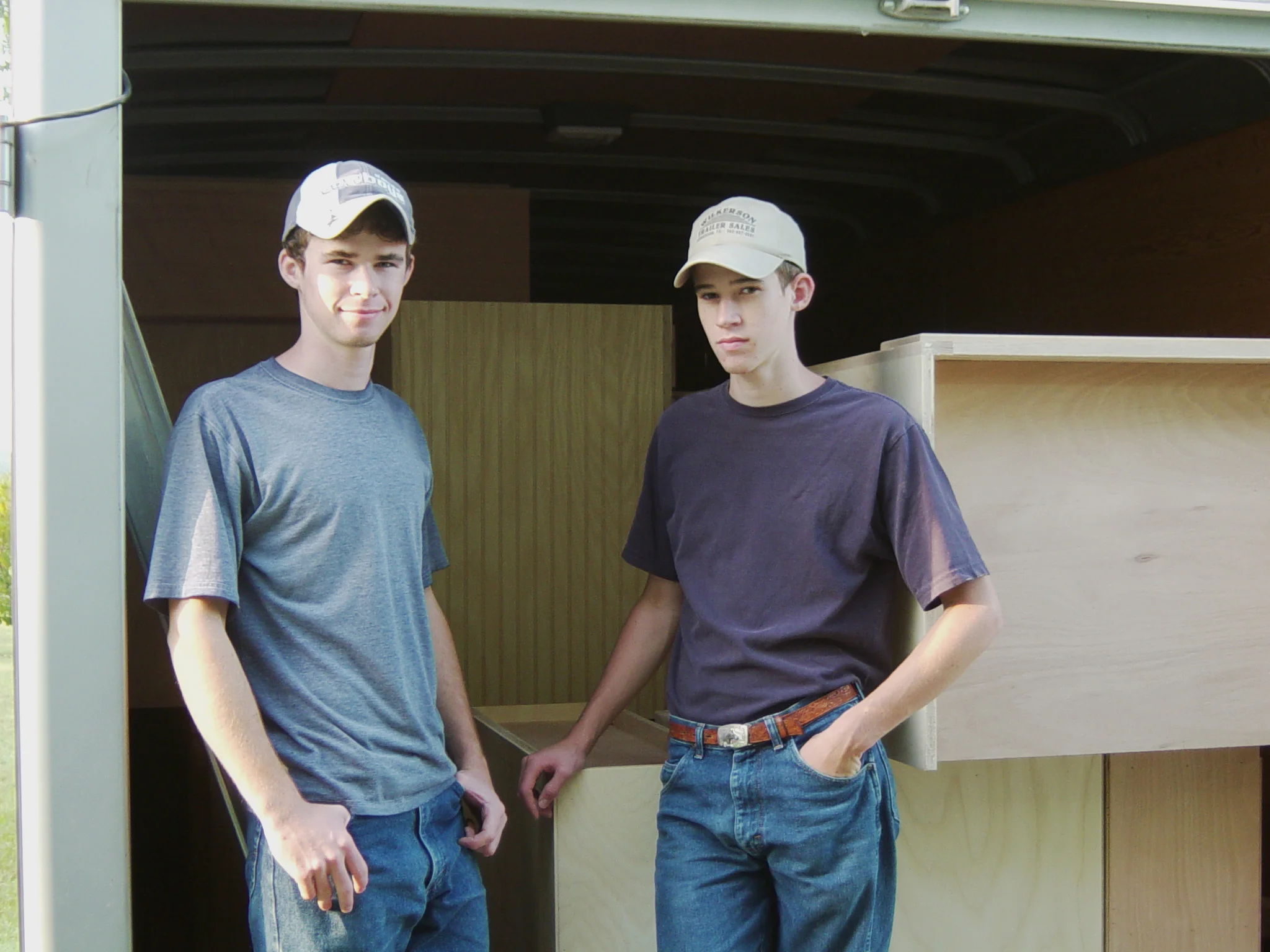 My brother James and I getting ready to set cabinets sometime in 2003.