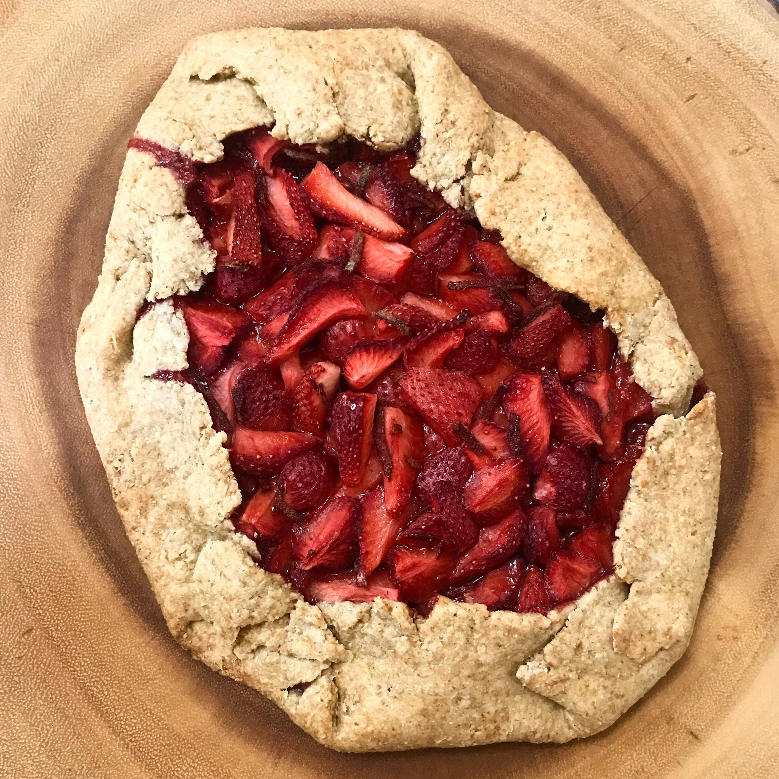 Rustic strawberry and sage galette baked until golden
