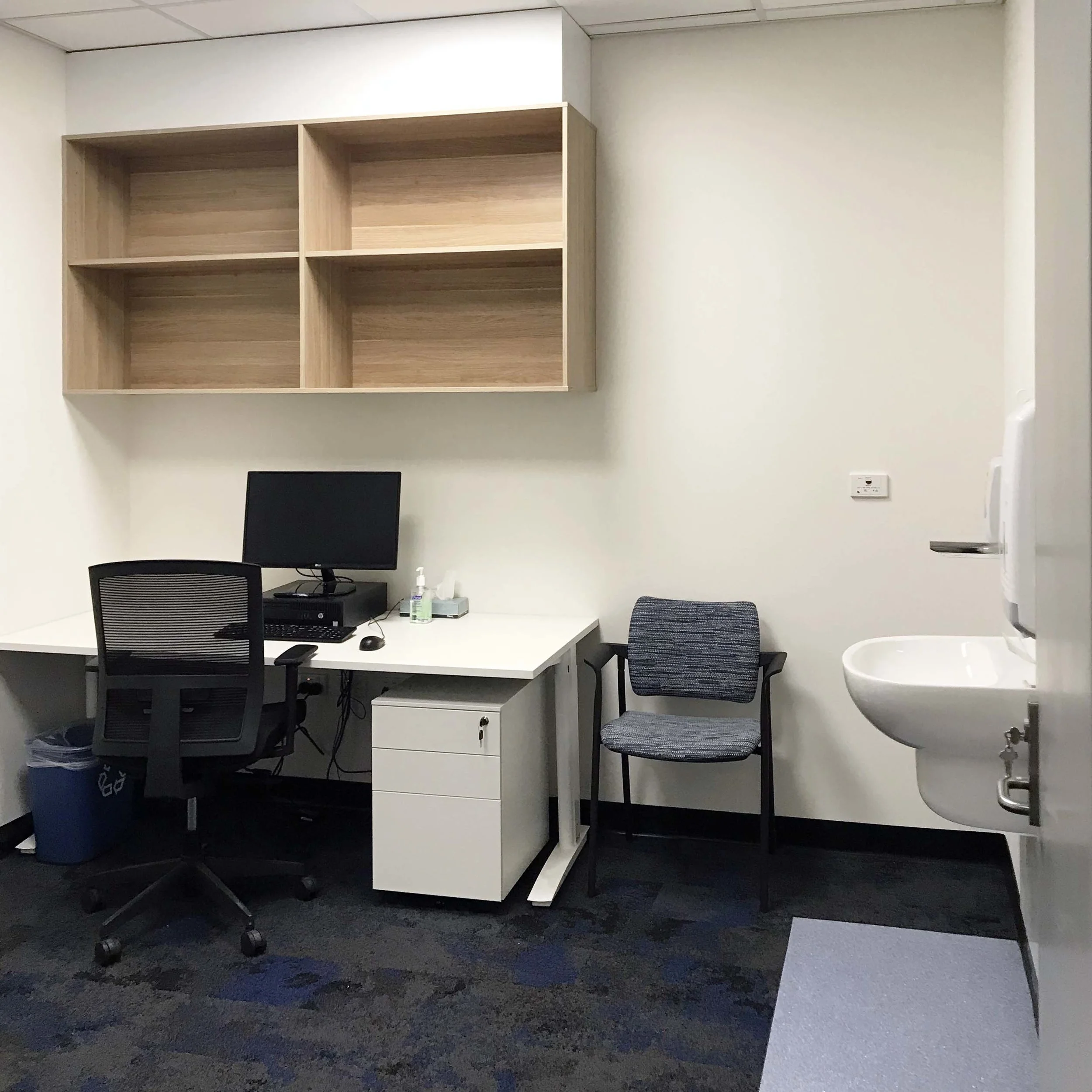 Flinders Private Hospital | Consulting Suite Services: Lucid Consulting Contractor: Partek Constructions Photographer: W+S A new consulting space created following the refurbishment and reconfiguration of back of house Administration to create vacant space for a new tenancy. The suite consists of a Reception/Waiting area, Office, 2x Consulting rooms and 2x Examination rooms. Staged with a condensed construction program over Christmas to allow the Hospital to function throughout.