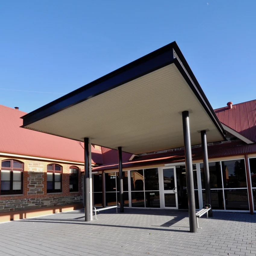 Plympton Primary School | Heritage Redevelopment Services + Structural Engineering: Meinhardt Contractor: Happy Valley Homes Photographer: W+S Redevelopment of the existing heritage building at Plympton Primary School, including new Entrance Canopy, Shade Structure, Entry Ramp and refurbishment of General Learning Areas, Library and Toilet facilities.