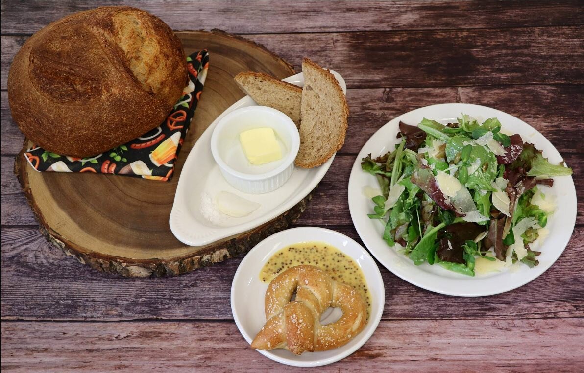 All of our Entree&rsquo;s come with a choice of House made Sourdough bread or pretzel and our house salad featuring greens from Seeds &amp; Spores Family Farm, Mighty Soil Farms, and sunflower sprouts from Applekamp &amp; Tonella Farms.  #eatlocal #s