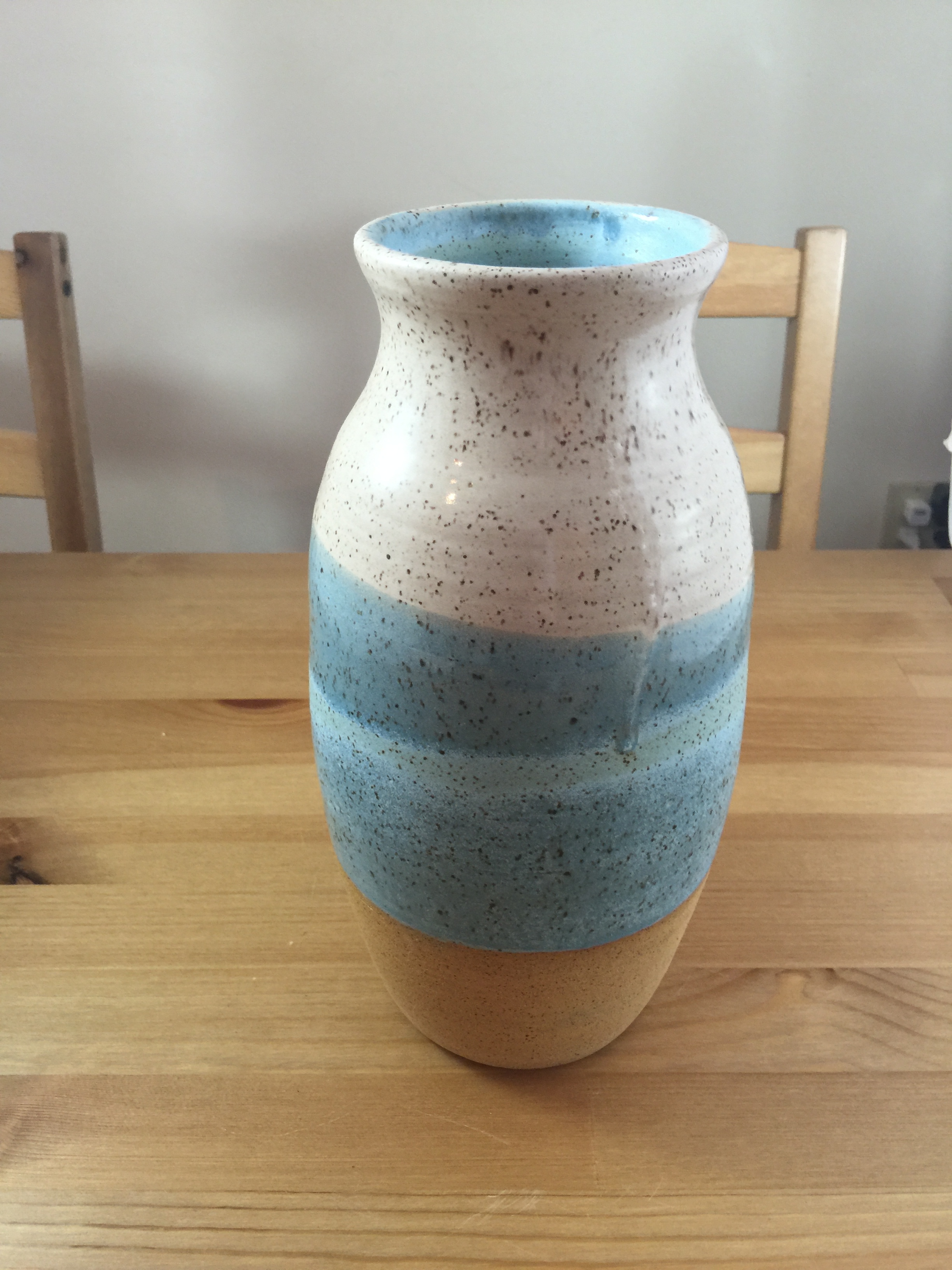large teal and white vase