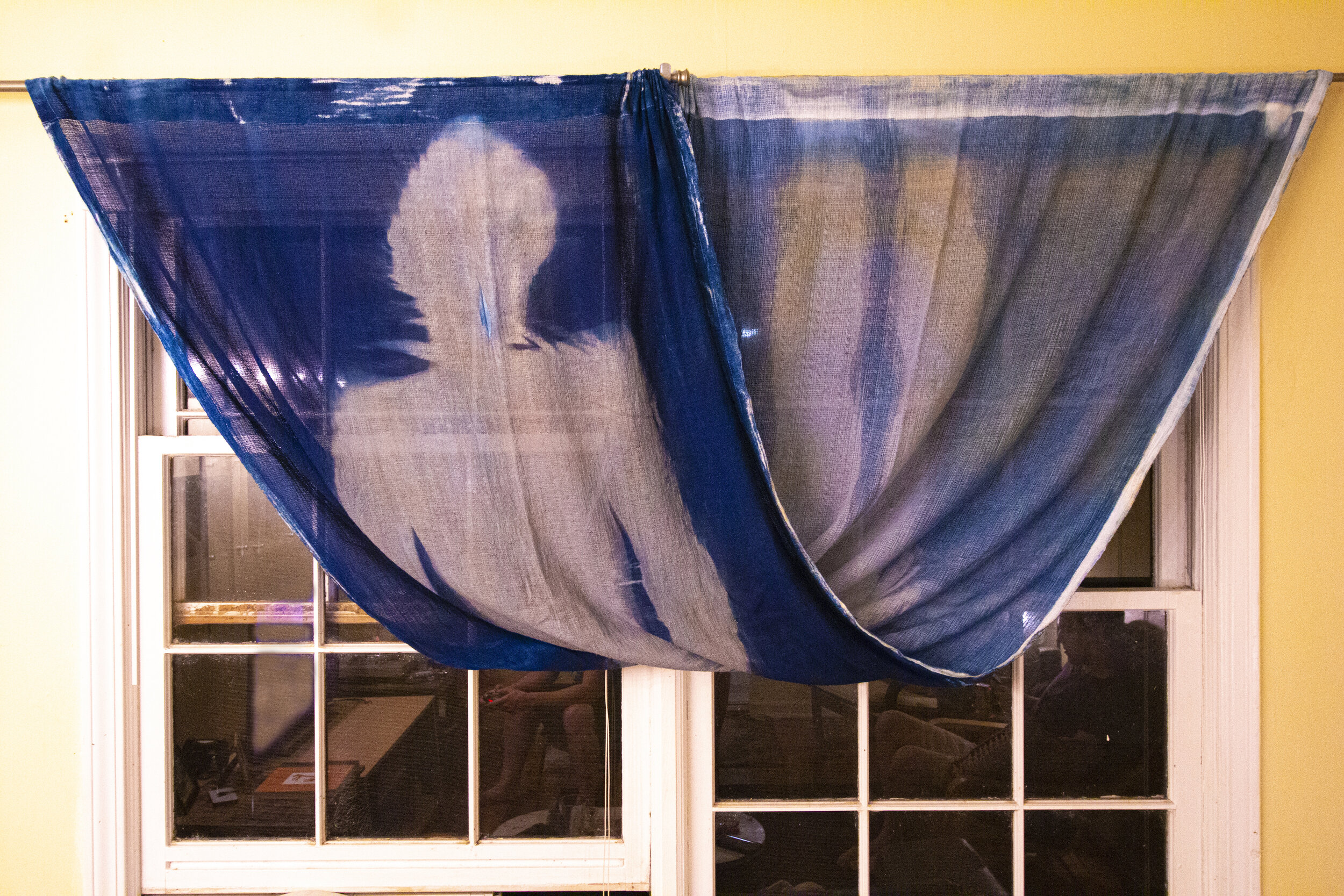 Half Twist [night], 2020, cotton curtain, cyanotype solution, curtain rod, and hardware, 110 x 42 inches