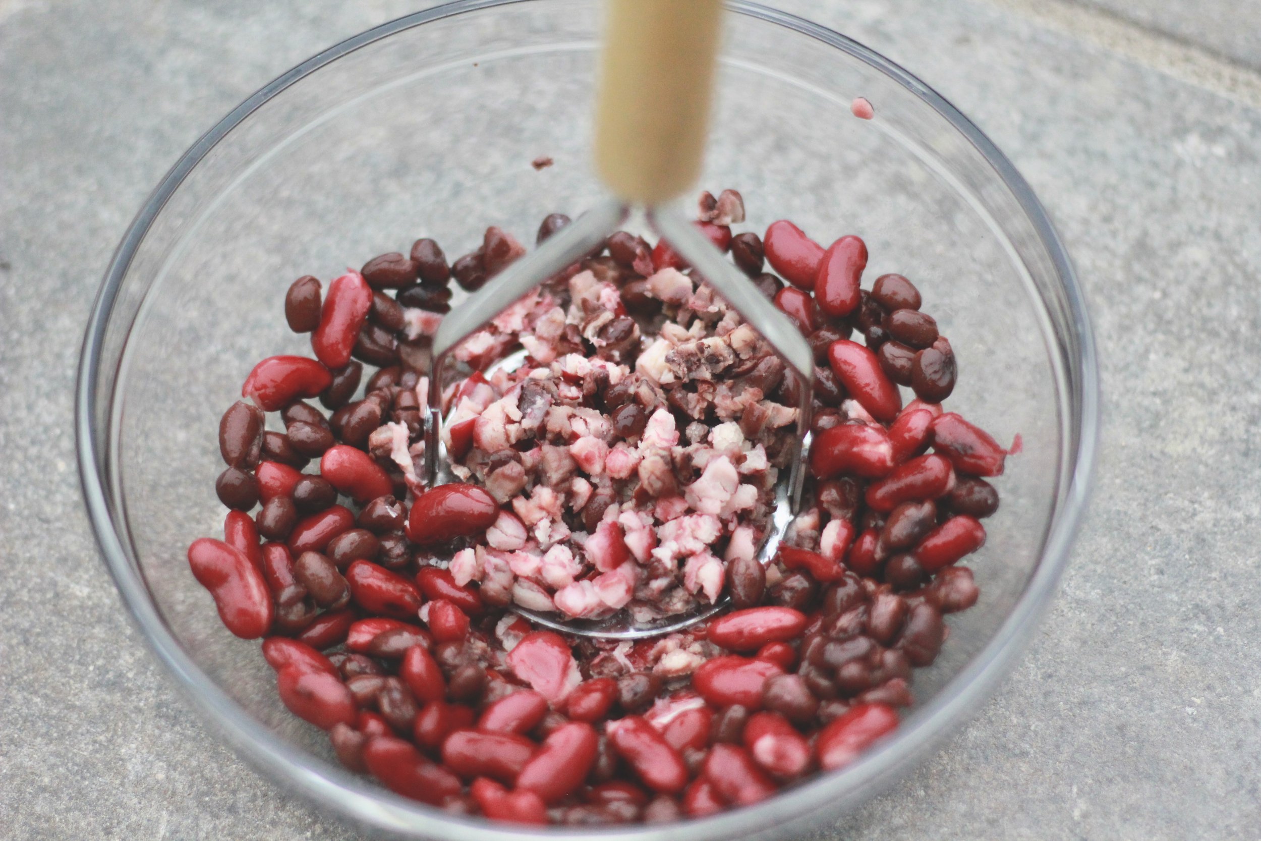Mash the beans to thicken the chili. it adds an amazing texture!