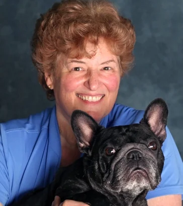 Deb with her French Bulldog, Audra ... Soren's daughter and the first Frenchie to become and AKC dual champion in Conformation and Agility.