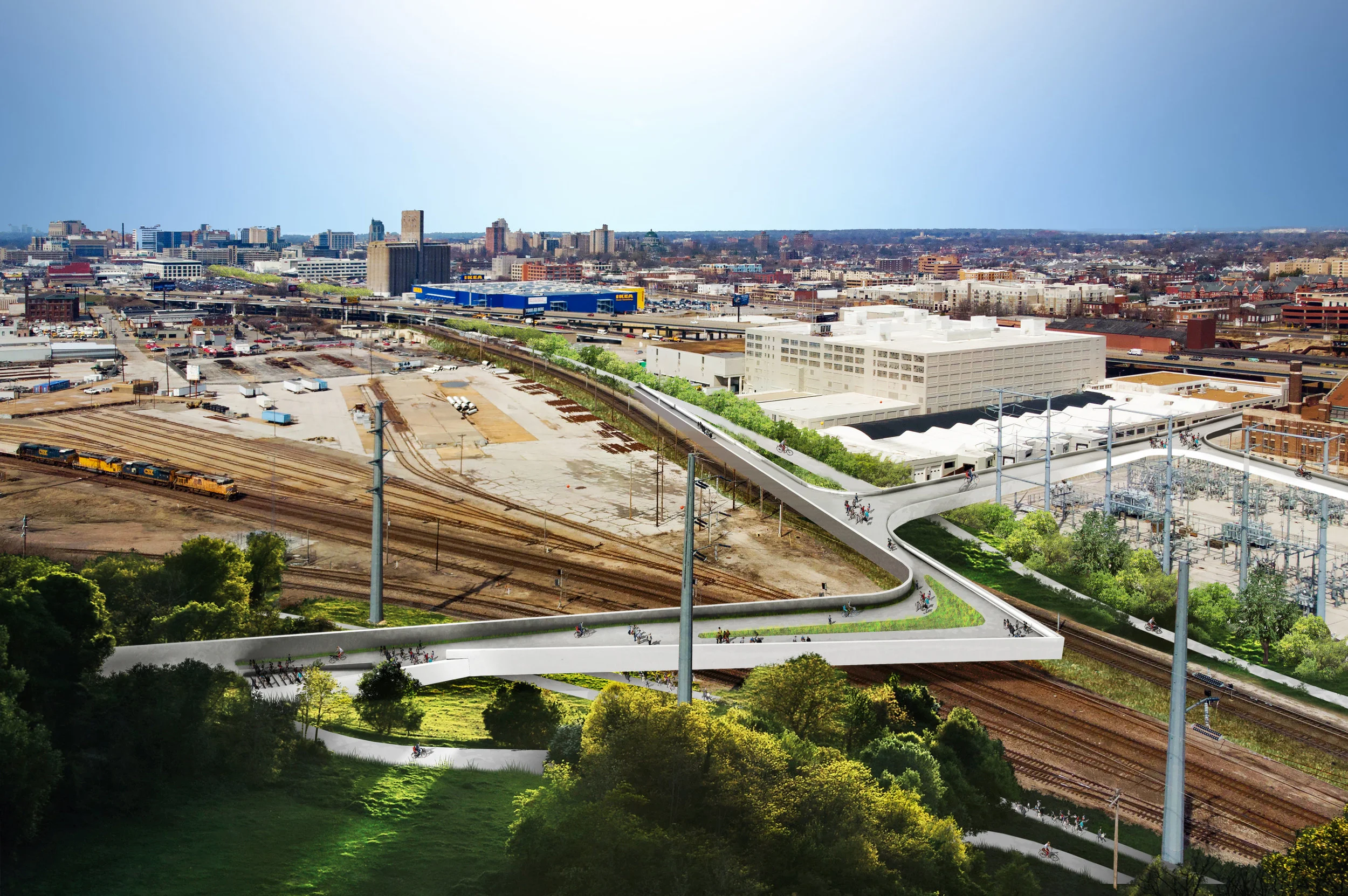 PROSPECT YARDS BRIDGE AND RAILYARD OVERLOOK The Prospect Yards Bridge and Railyard Overlook creates a vital connection between the East-West Greenway adjacent to the MetroLink line between Cortex and Grand stations and the Greenway running adjacent to the Union Pacific Freight Rail line that ends at Chouteau’s Landing. Reconnecting Spring Street creates not only a pedestrian and bicycle route between St. Louis University’s North and South Campuses under and over I-64, but a spectacular overlook that celebrates the presence of the railyard with a view of the Gateway Arch beyond. The Spring Street bridge also allows the Greenway to extend South through the Shaw neighborhood to loop together all four parks with Tower Grove Park as its largest Southern anchor.