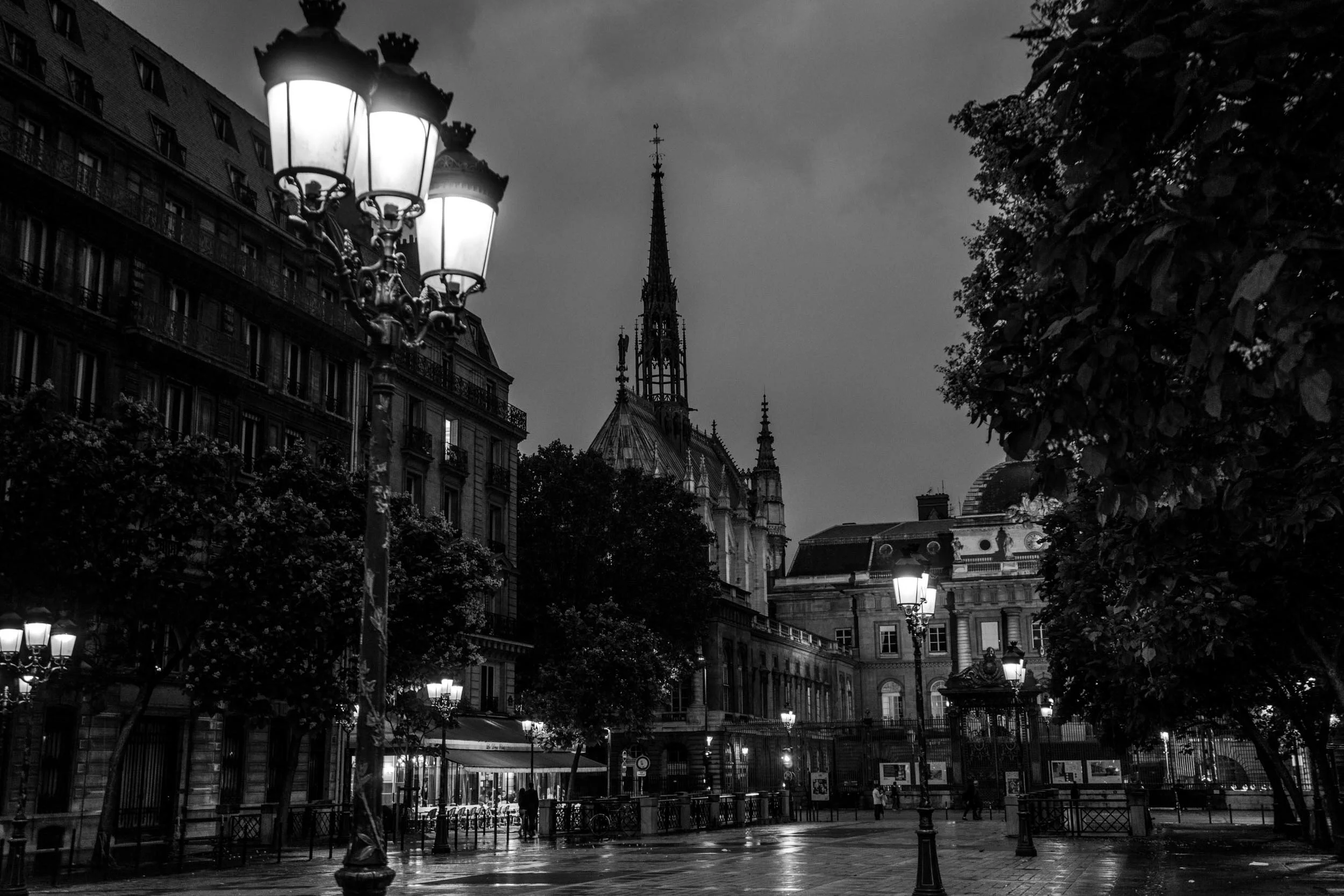 Paris France at night with Cathedral and lamp posts in black and white urban architecture photography_.jpg