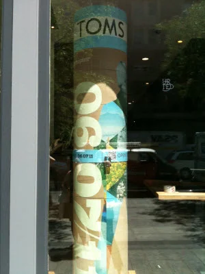 TOMS-branded mystery capsule sighted at The Tannery on Boylston Street, Boston, MA.