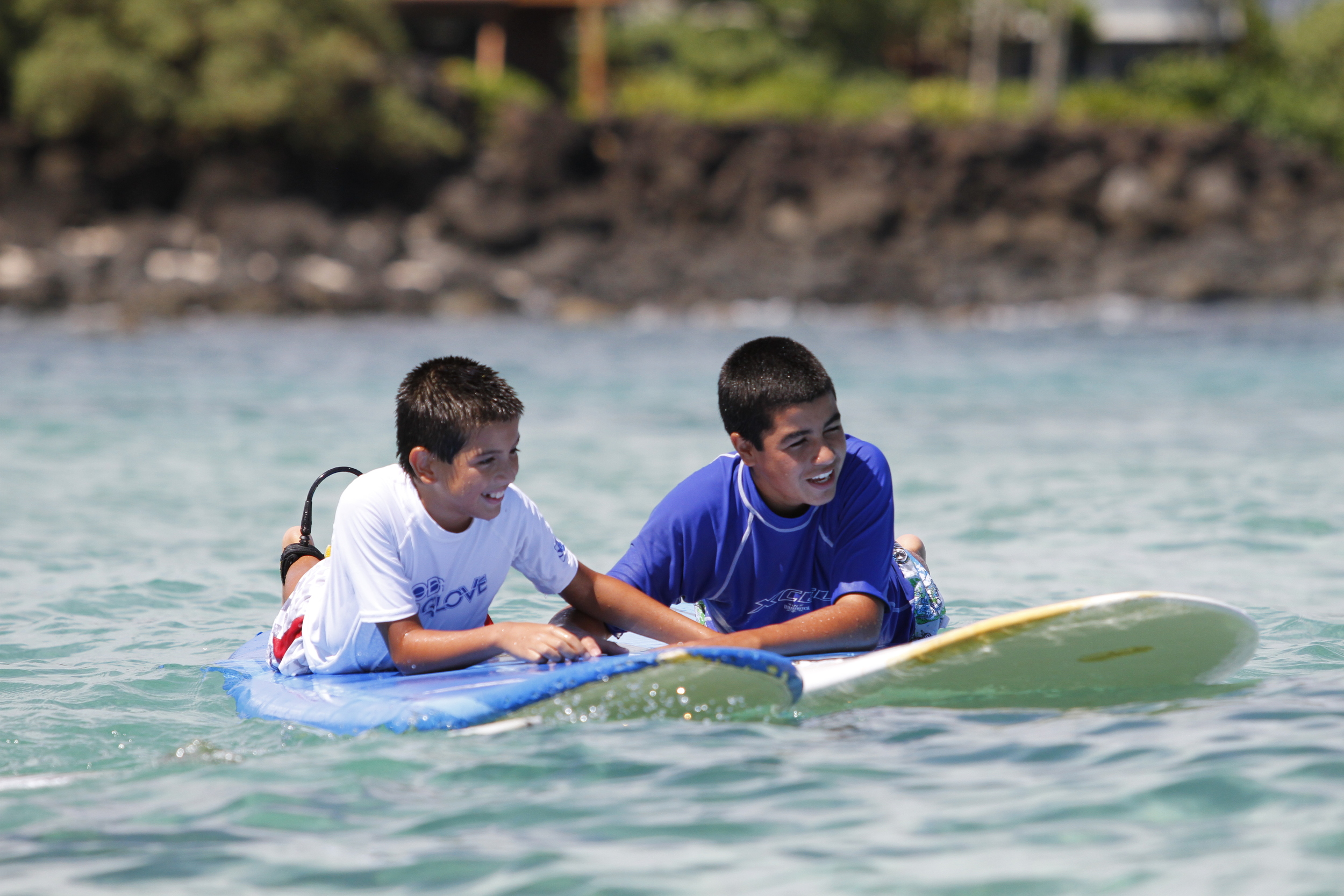 Catholic Surfing Ministries - Friends holding boards