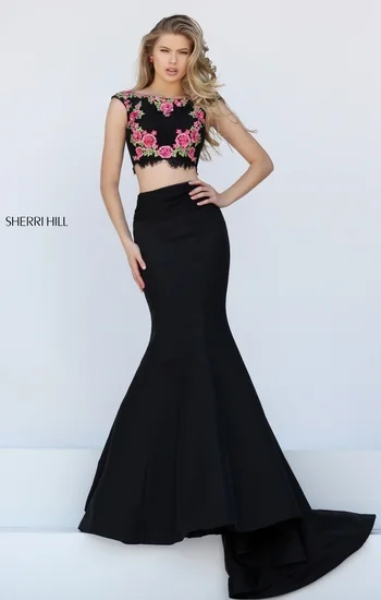 Sherri Hill always has the best PROM DRESSES. Floral prints and the Mermaid fit is this it dress right now!
