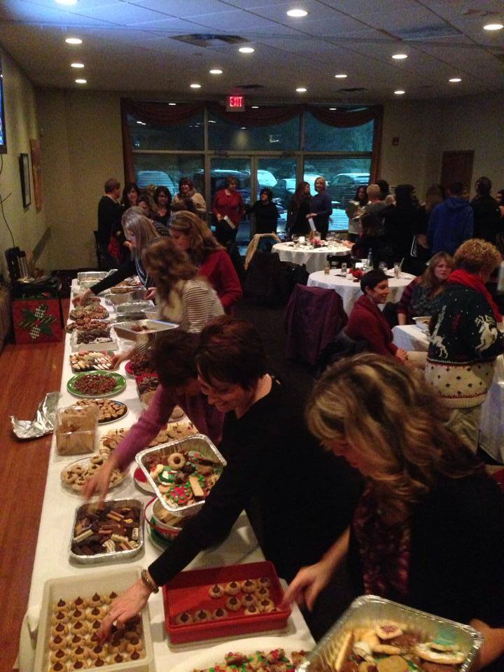 people getting food in buffet at private dining event space