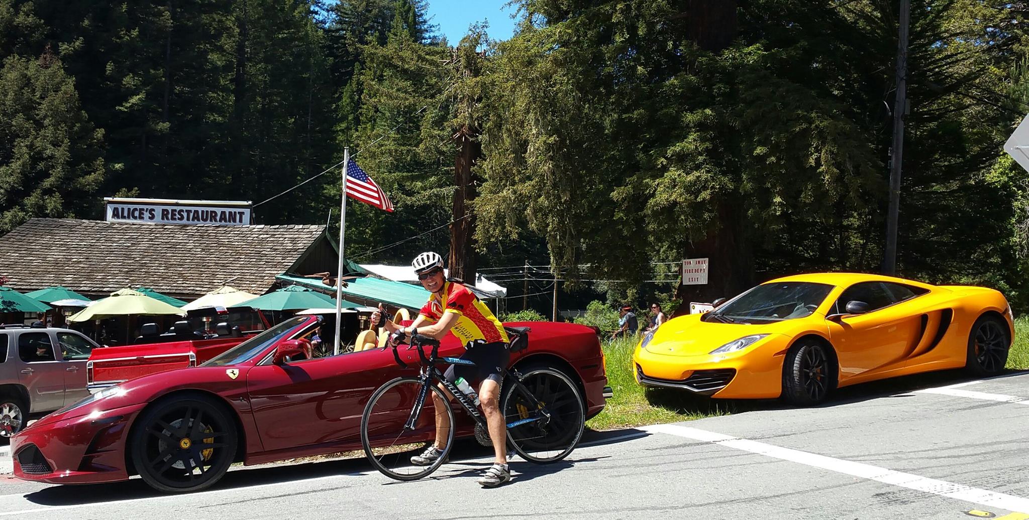 John can't choose which car matches his jersey more! 