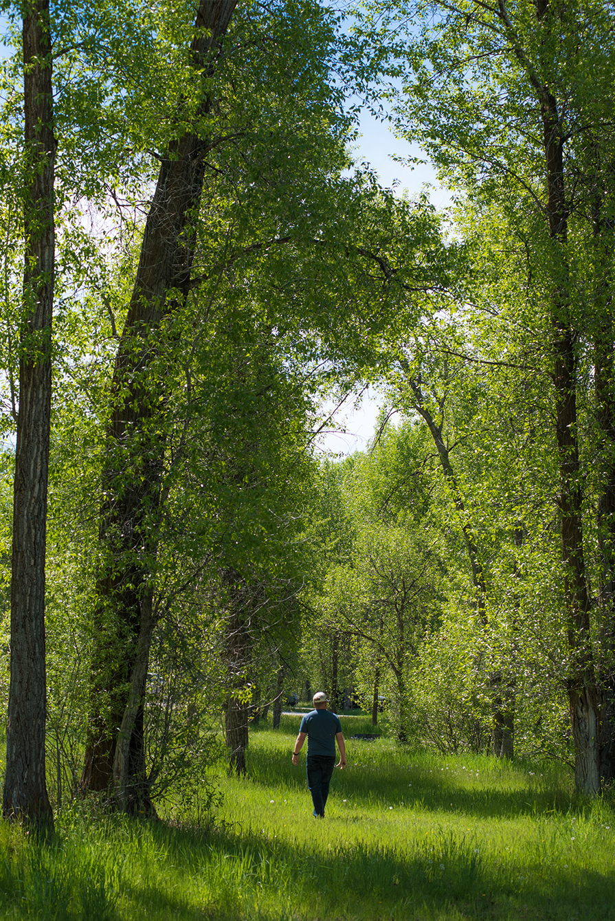 Crew member troy looking for the perfect sherpa tent space