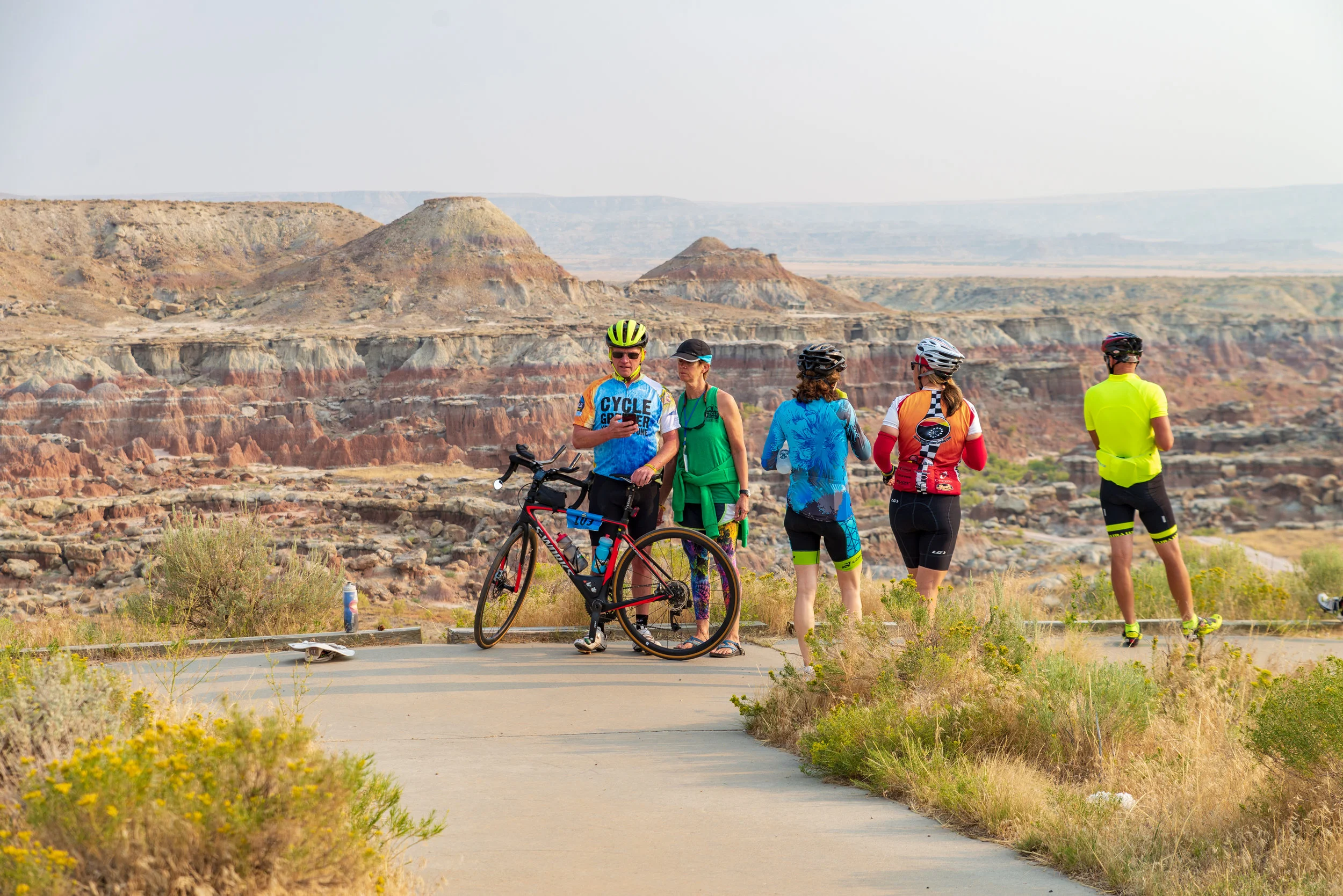 Cyclists visit Gooseberry Badlands, an area accessible by a backroad and short hike in the Greater Yellowstone area outside of Meeteetse, WY. Nickolas Olson Photography for Cycle Greater Yellowstone