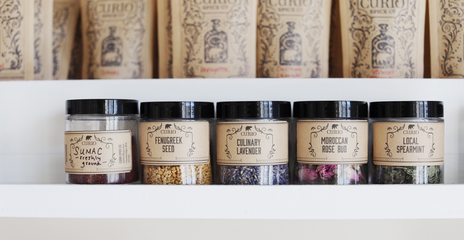 A colorful selection of herbs and spices at Curio Spice.