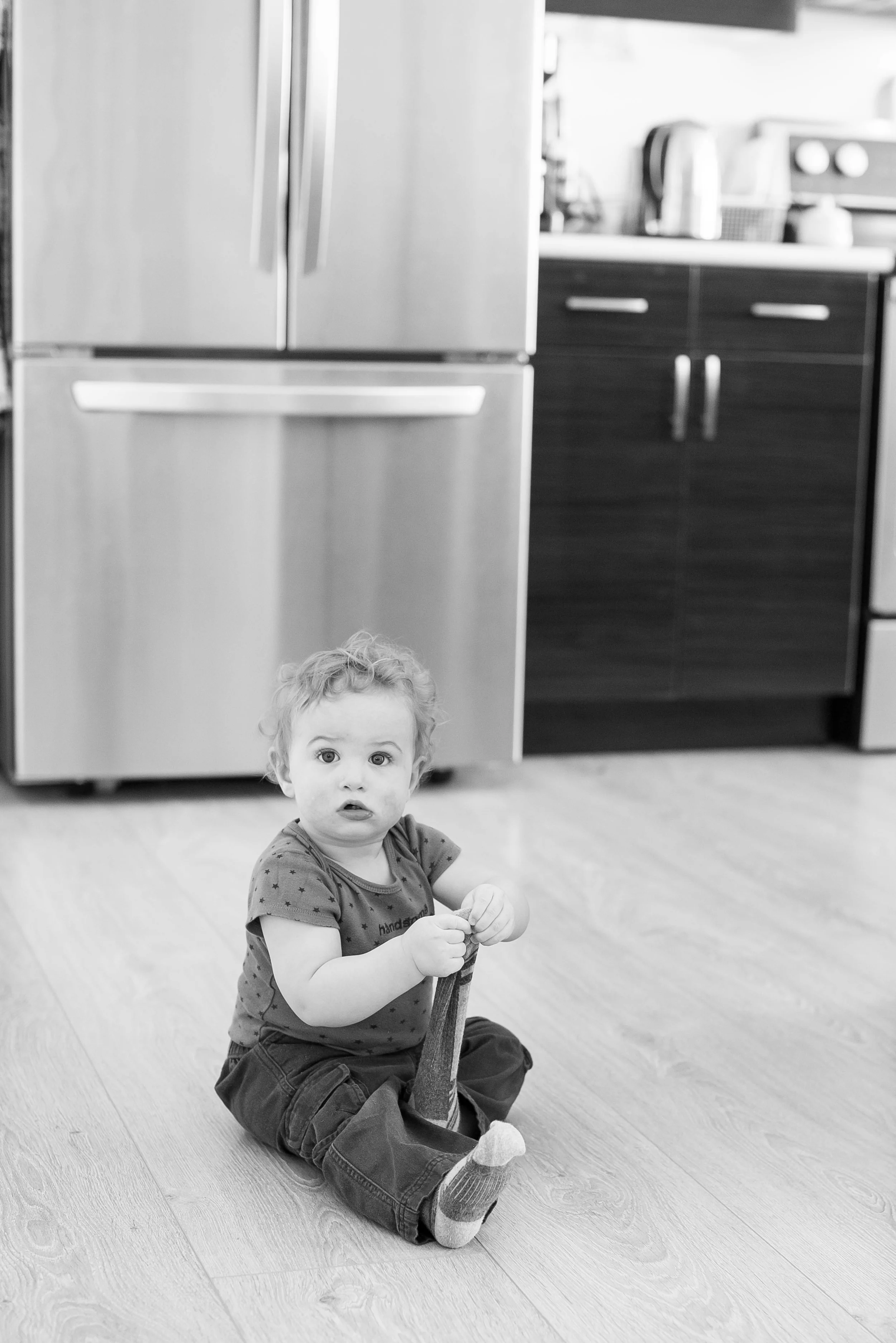 According to Heidi, this is a completely accurate portrayal of how Myles feels about socks... the socks seriously only lasted for like 5 minutes of the photo shoot before he ripped them off his feet!