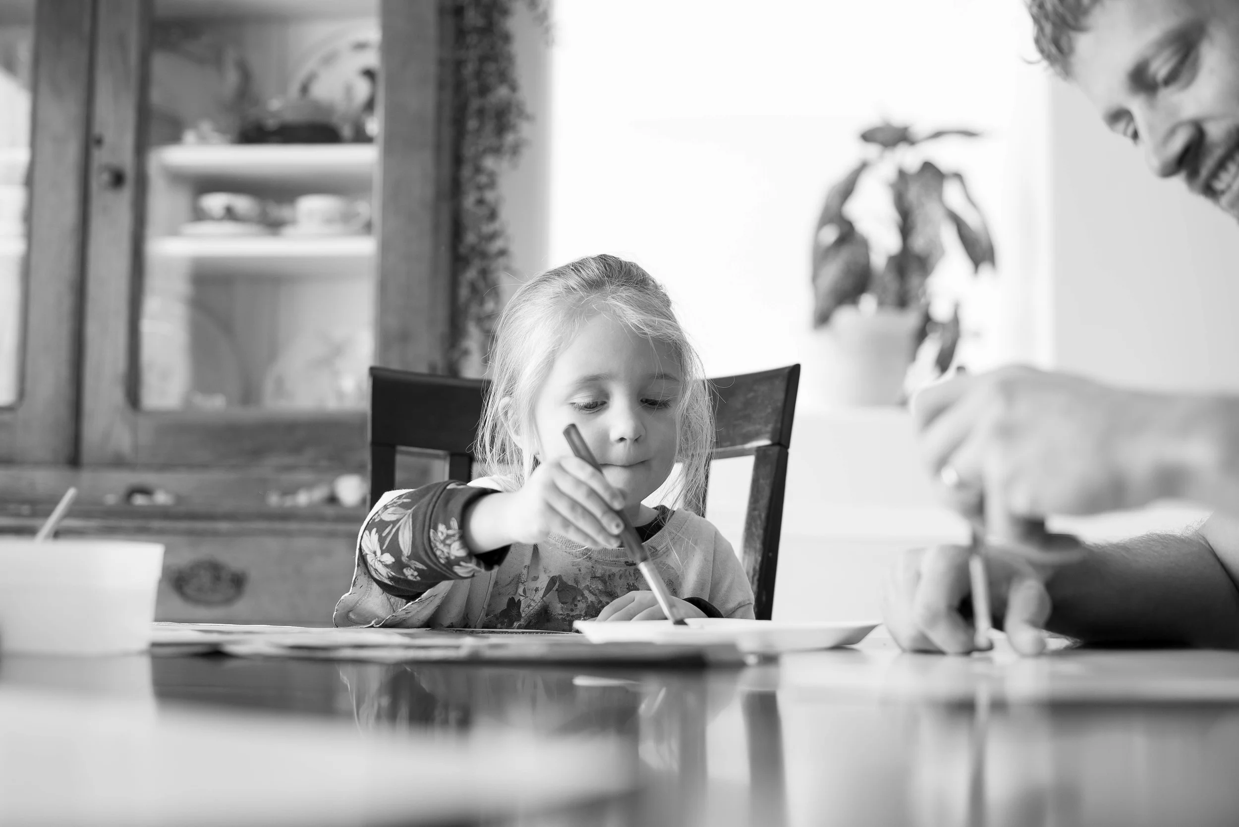 Ava loves painting with her daddy...