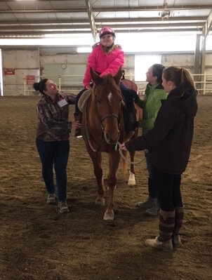 She loves hippotherapy