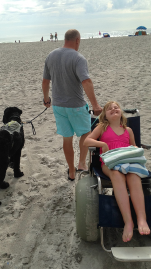 Elouise and Dad on the beach