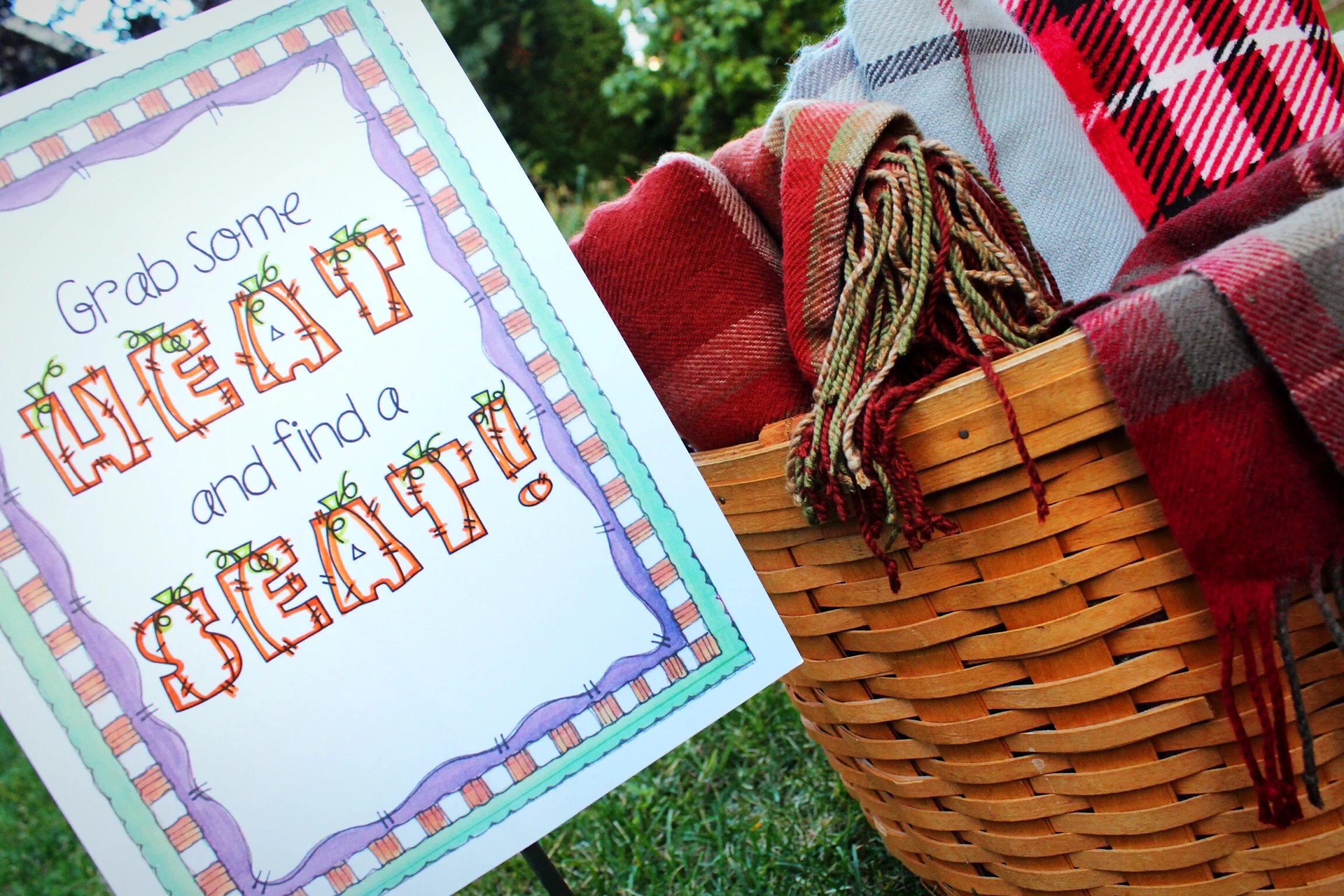 Outdoor Halloween Movie Night Blanket Seating Basket Sign Design Organize Party.jpg
