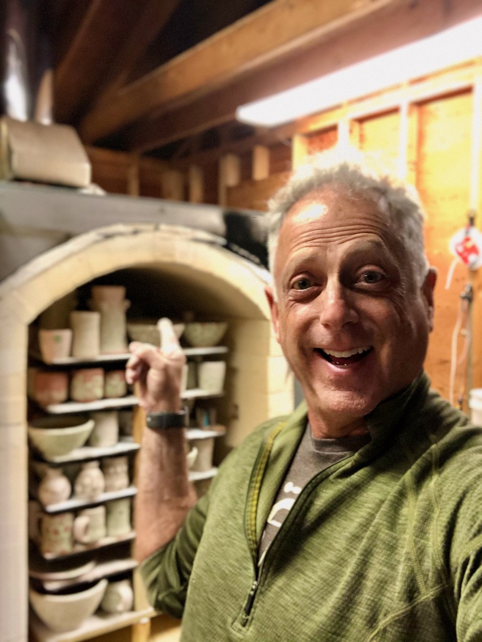 paul wisotzky in front of reduction kiln