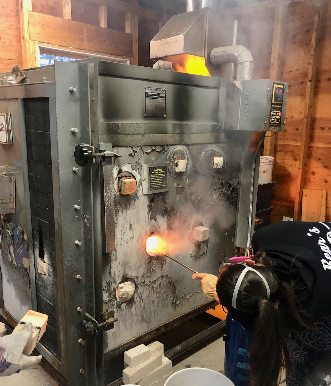 spraying soda into the kiln