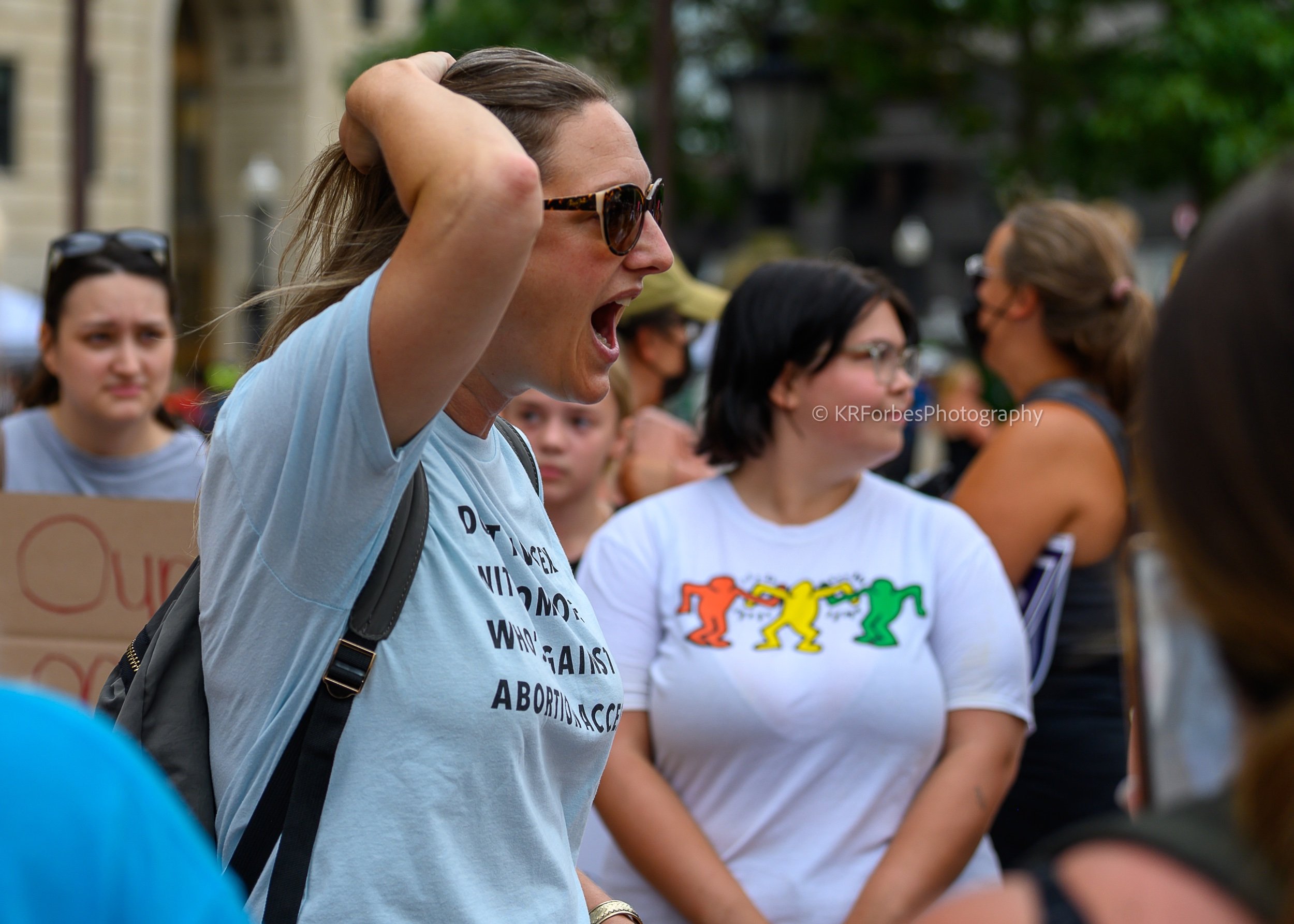  Woman attending the Ohio Democrats rally at the Ohio Statehouse, mistakes a group of socialist pro choice activists for anti-abortion activists. 