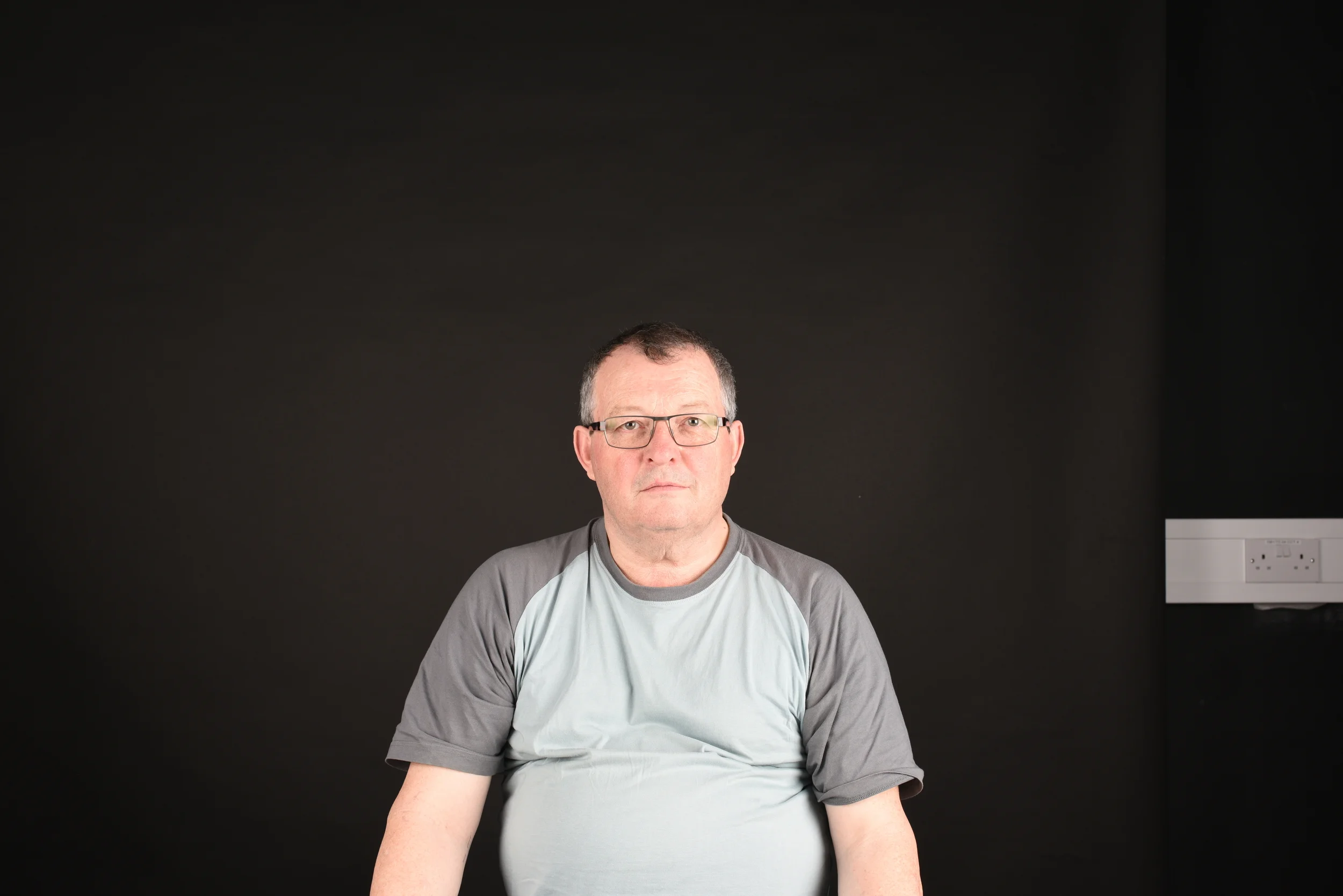 Shot with subject holding reflector beneath their face