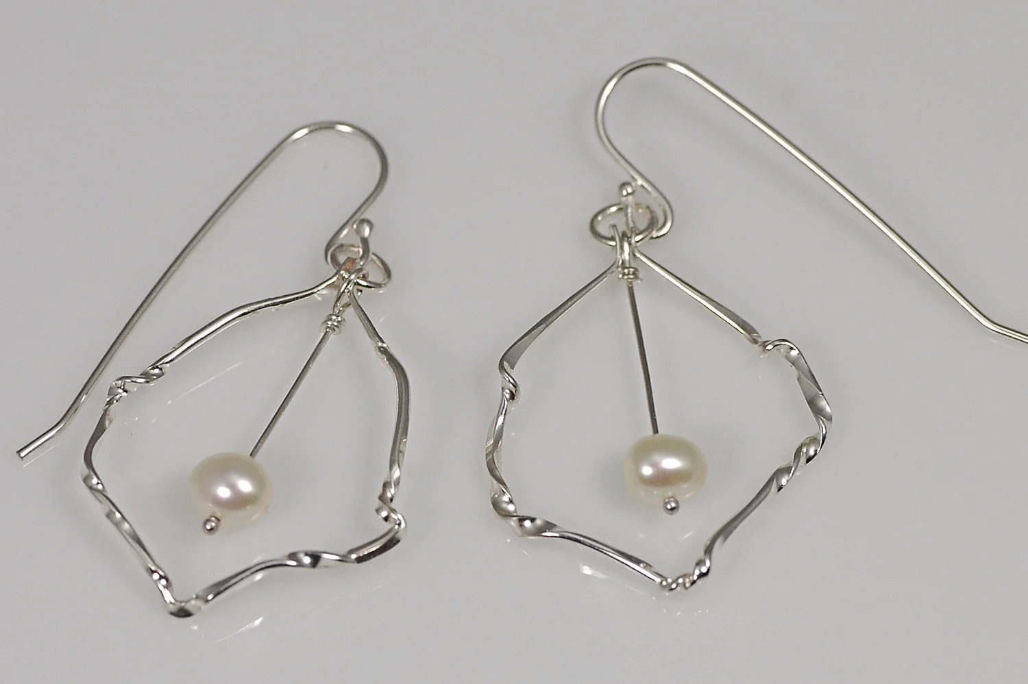 Forged silver, pearls
