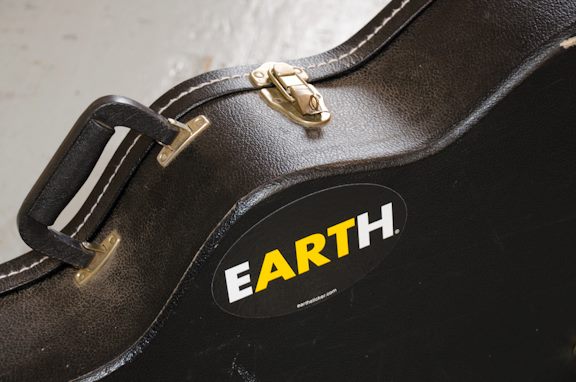 Earth Sticker Yellow Oval Guitar Case.jpg