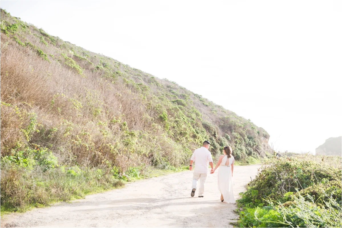 Engagement photo shoot at Four Mile Beach in Santa Cruz, CA. Pictures by Briana Calderon Photography based in the San Francisco Bay Area in California.