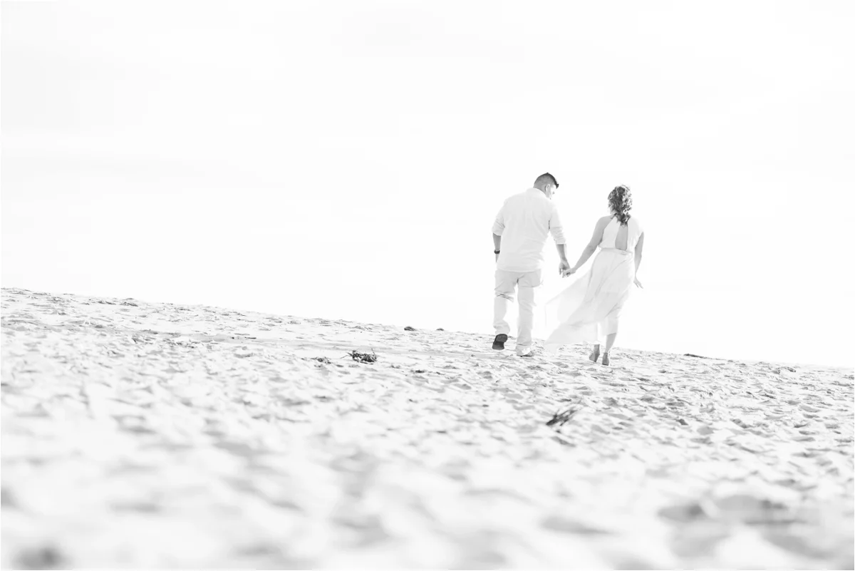 Engagement photo shoot at Four Mile Beach in Santa Cruz, CA. Pictures by Briana Calderon Photography based in the San Francisco Bay Area in California.