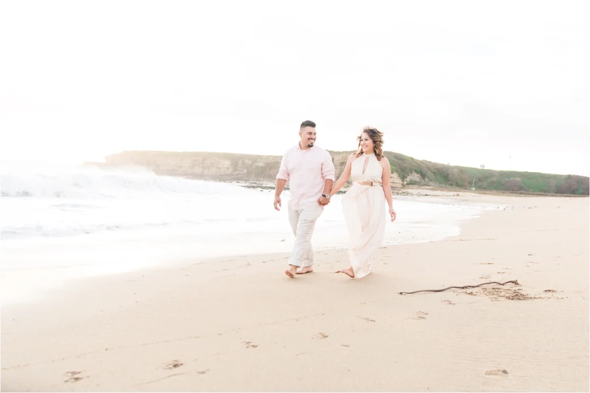 Engagement photo shoot at Four Mile Beach in Santa Cruz, CA. Pictures by Briana Calderon Photography based in the San Francisco Bay Area in California.