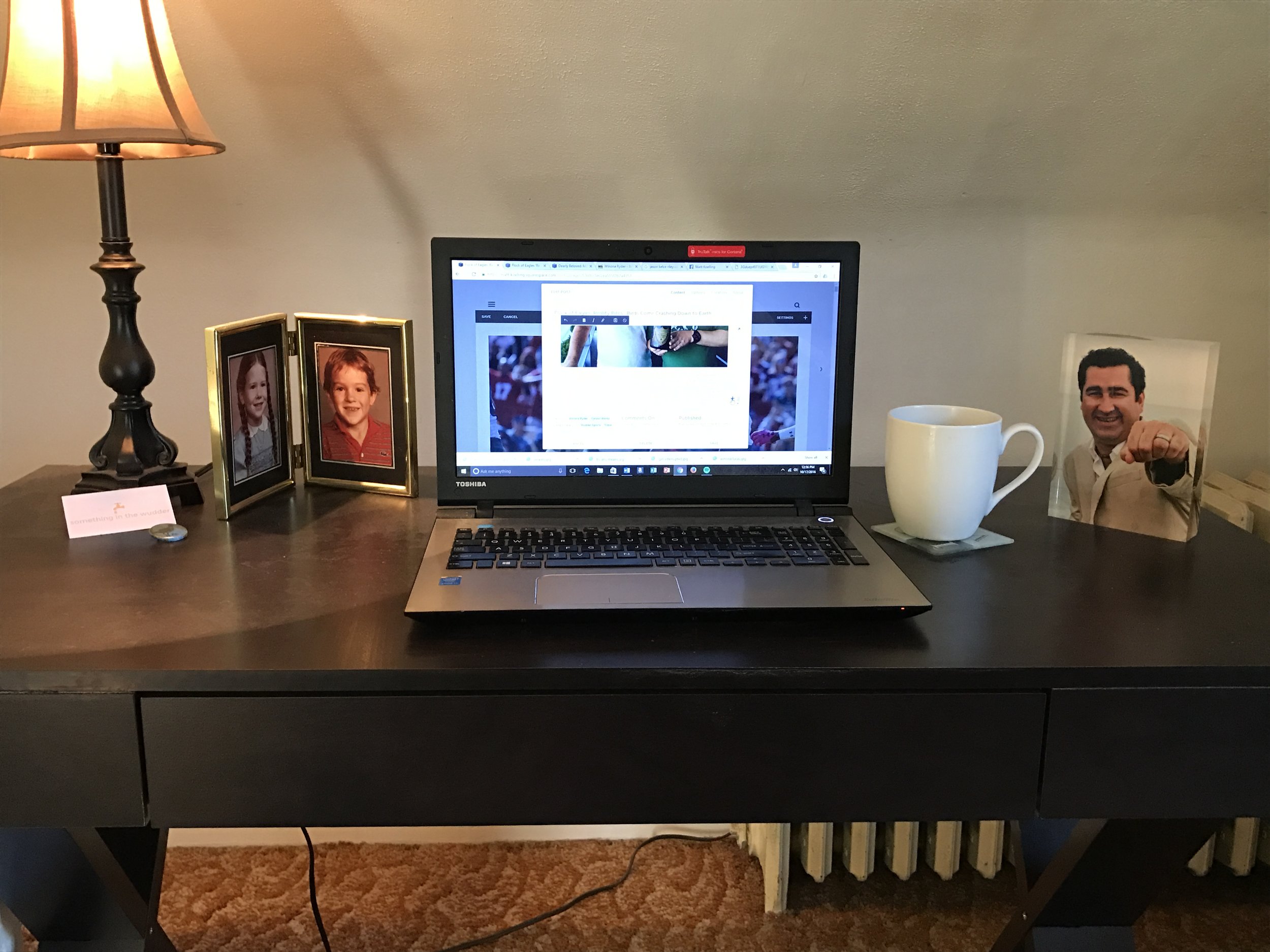 Below is a live look-in at where I'm typically tapping out most of this stuff on a daily basis. I try to keep my desk free of clutter but nothing you see on this desk is there by accident, while I'm beginning to really believe nothing that happens in life is either.